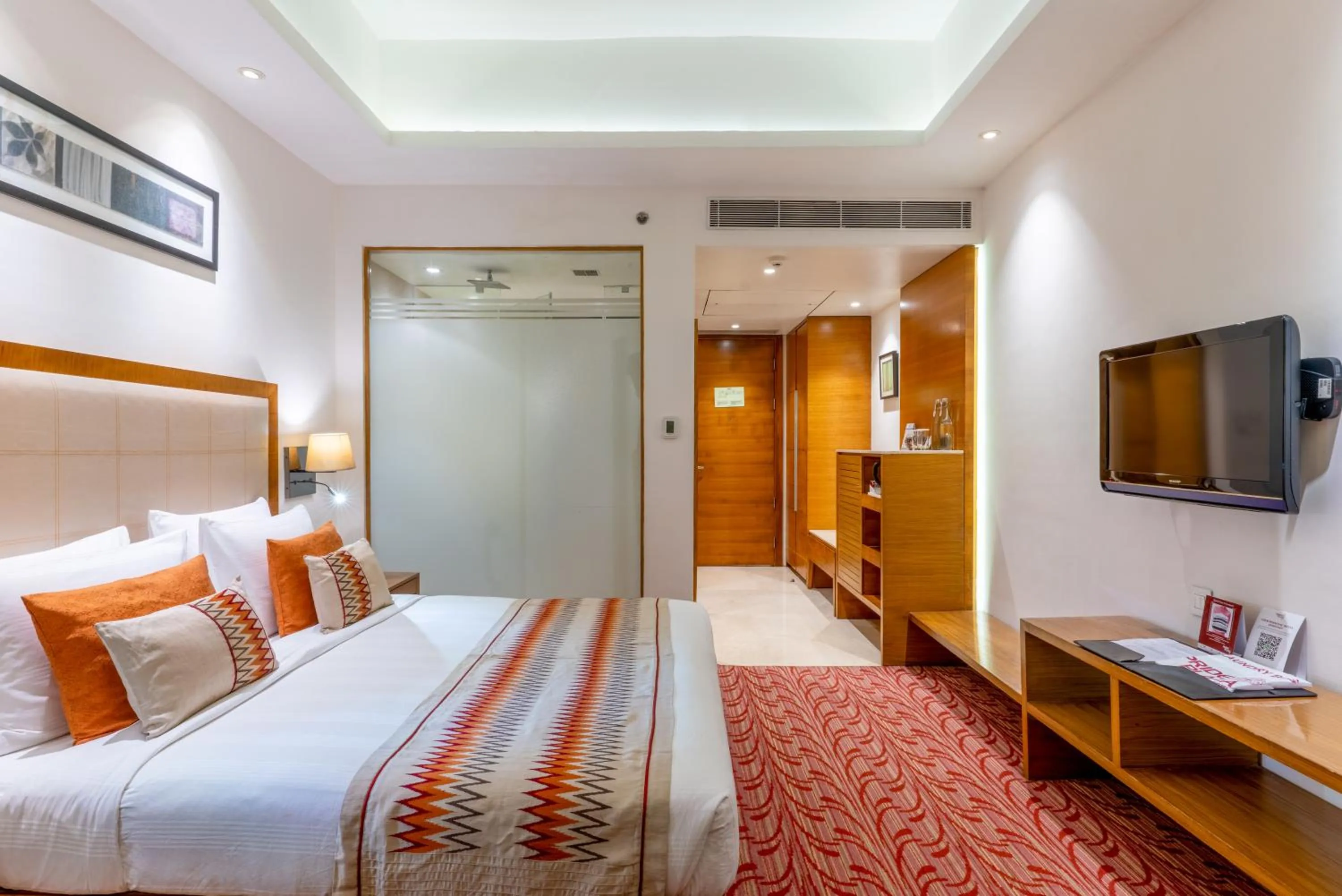 Photo of the whole room, Bed in Pride Plaza Hotel, Kolkata