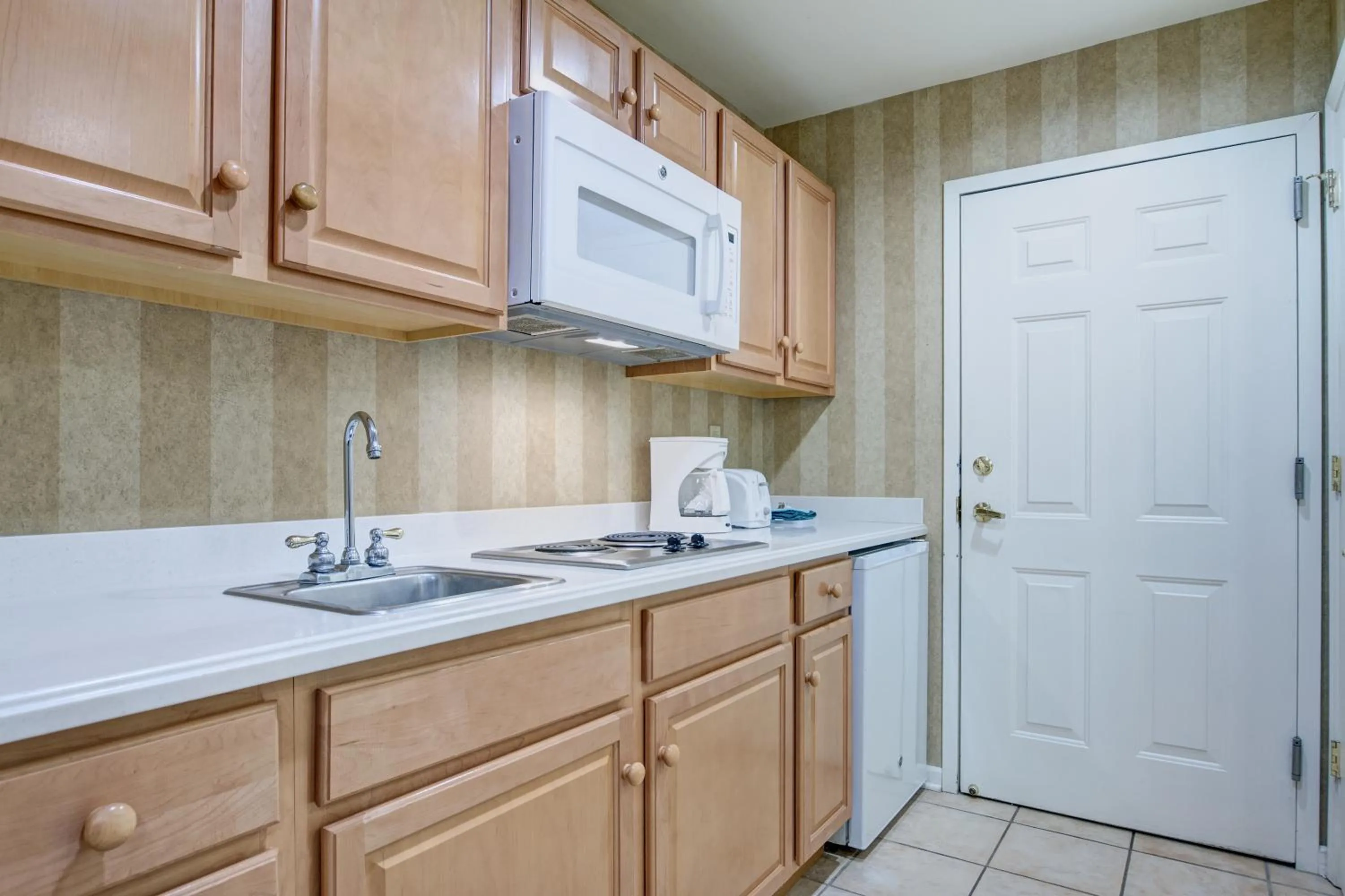 Kitchen or kitchenette in Pocono Mountain Villas by Exploria Resorts