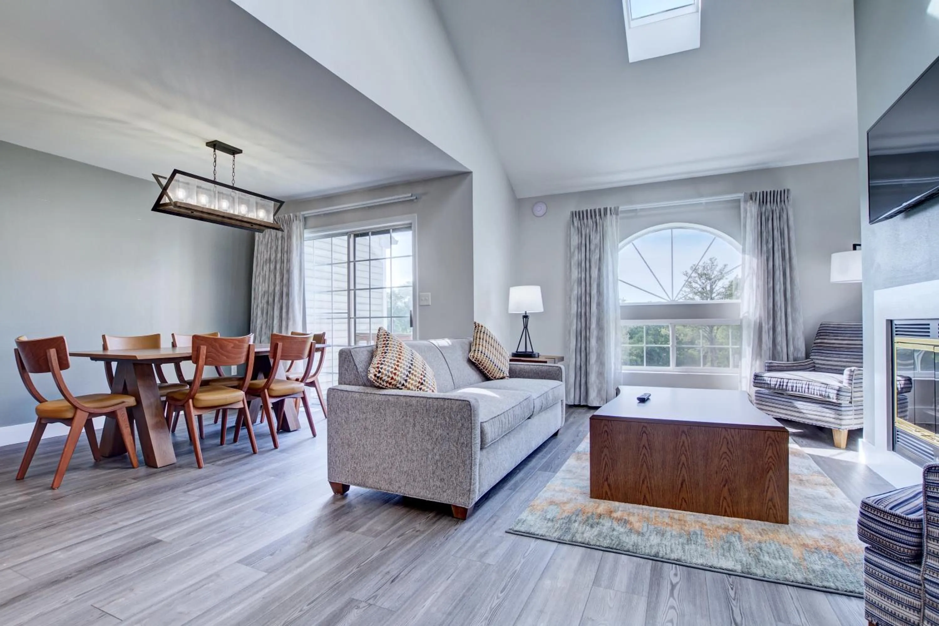 Living room in Pocono Mountain Villas by Exploria Resorts