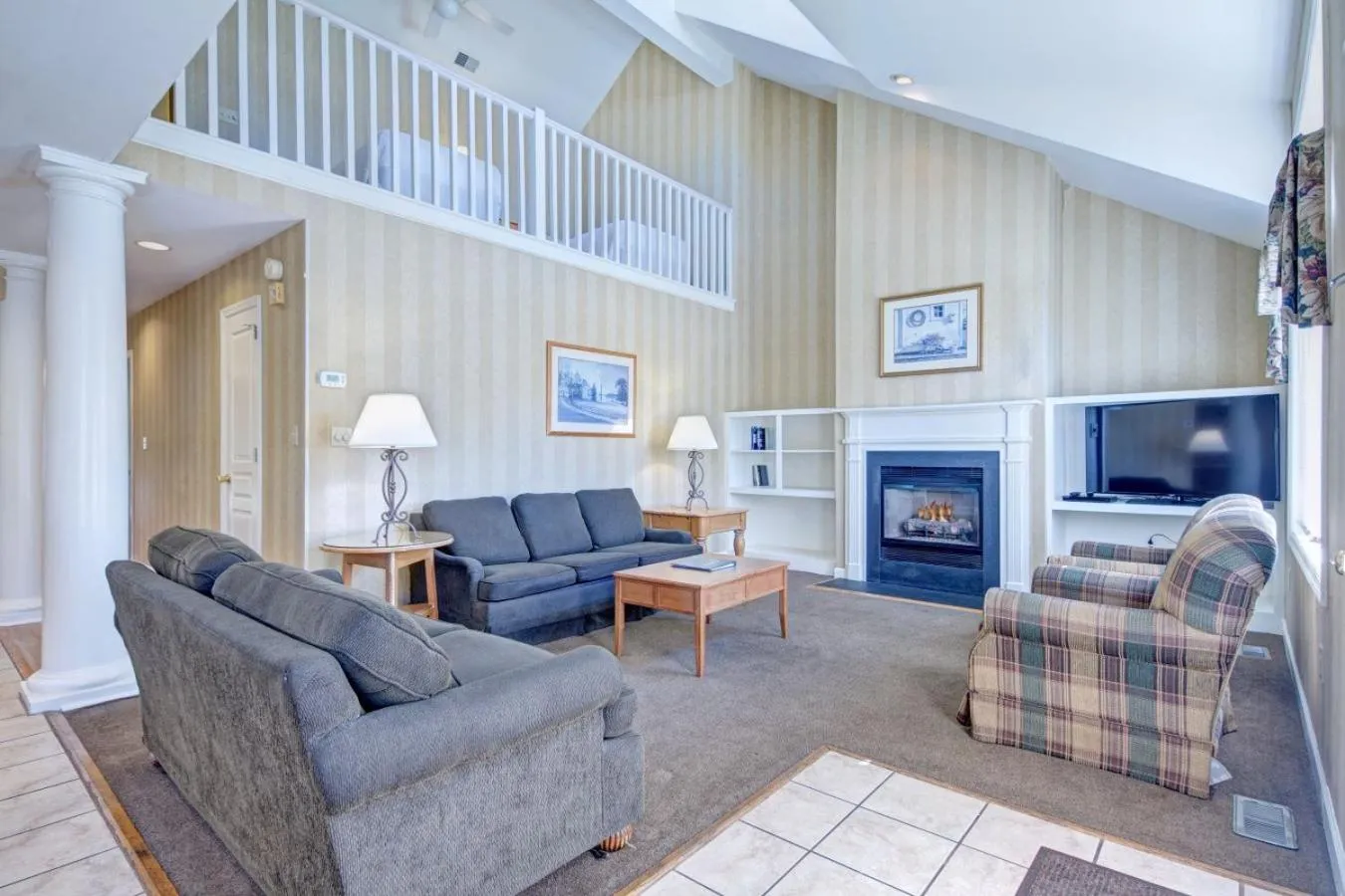 Living room in Pocono Mountain Villas by Exploria Resorts