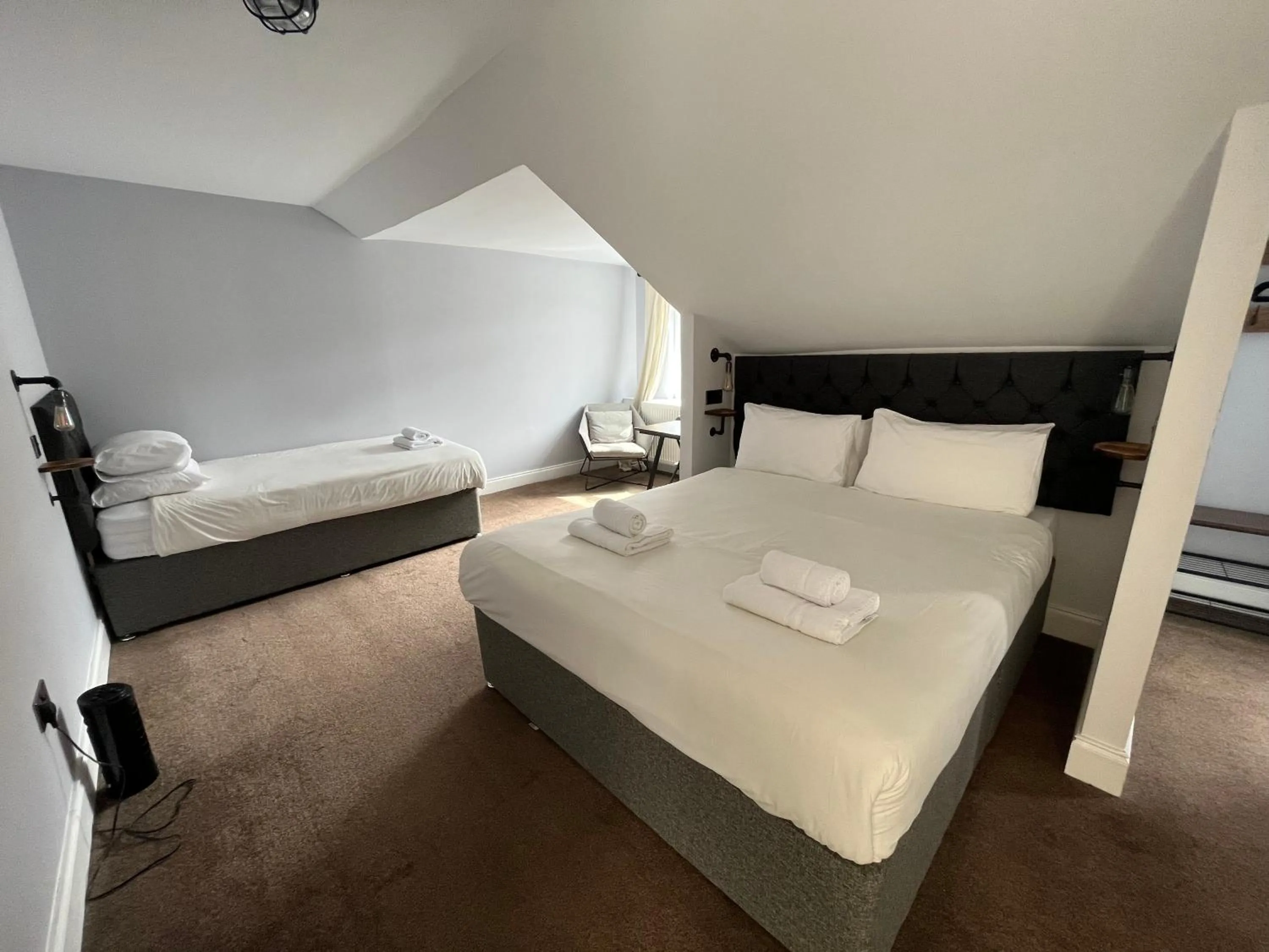 Bedroom in The Kelvin Hotel