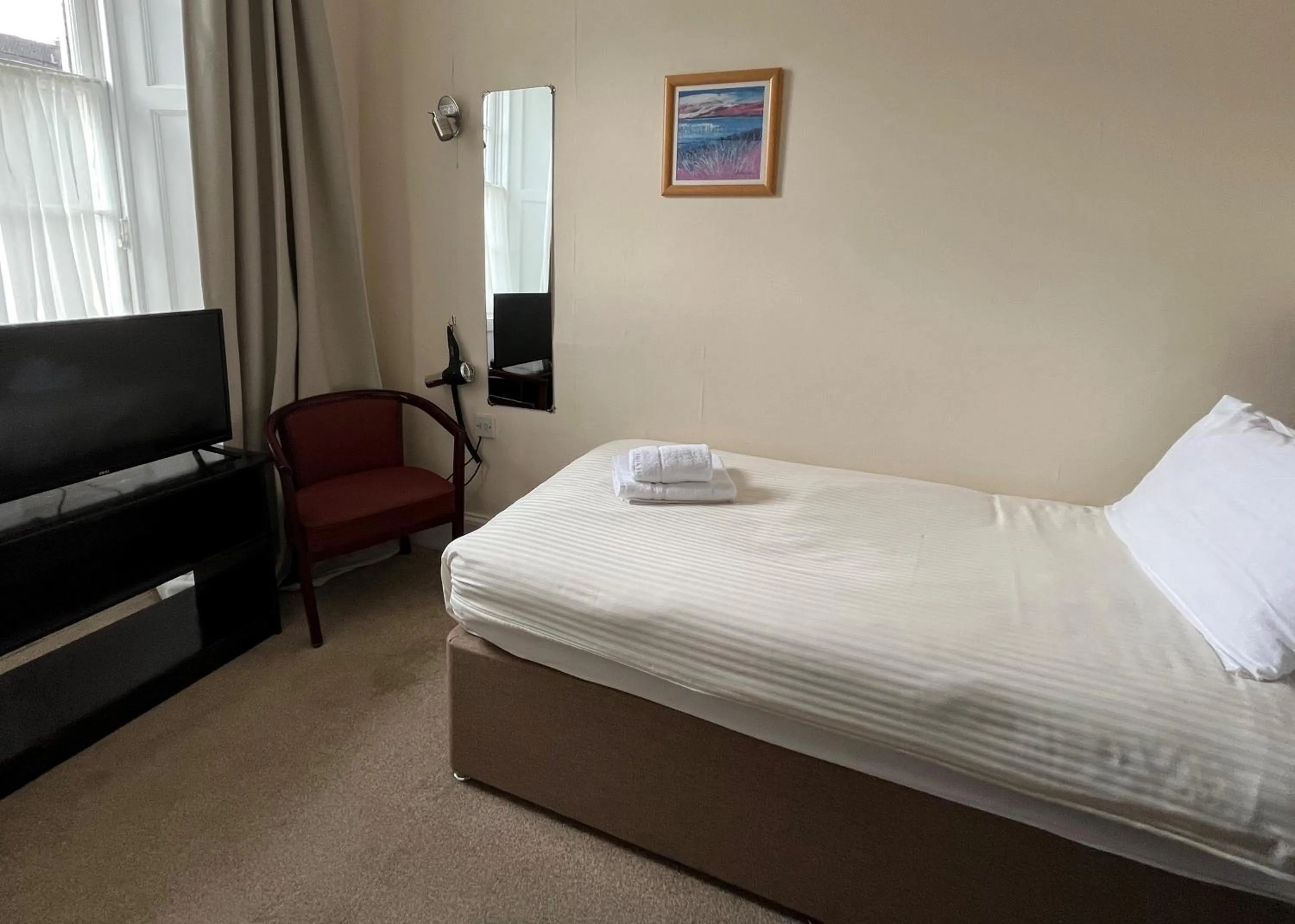 Bed in The Kelvin Hotel