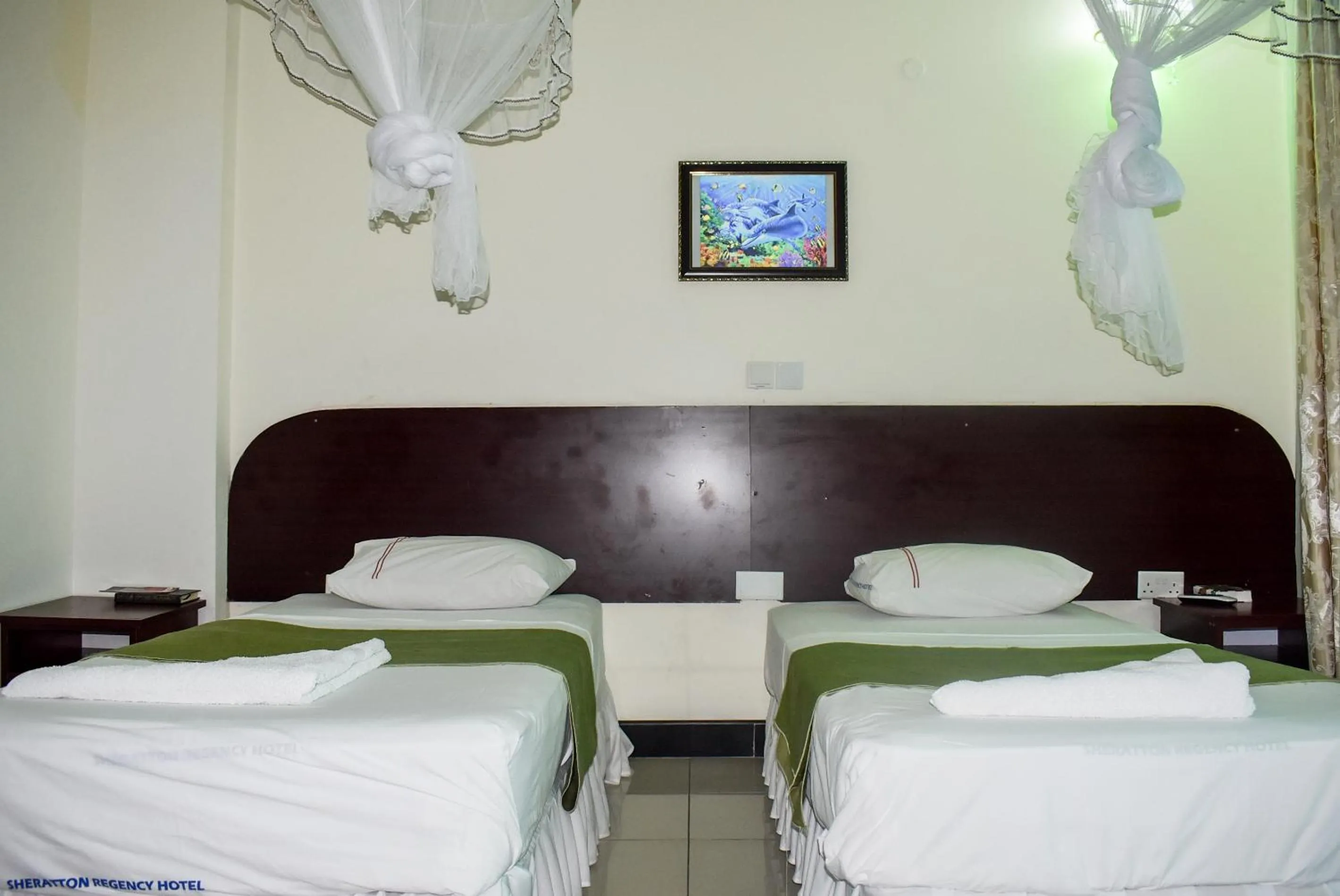 Bedroom, Bed in Sheratton Regency Hotel