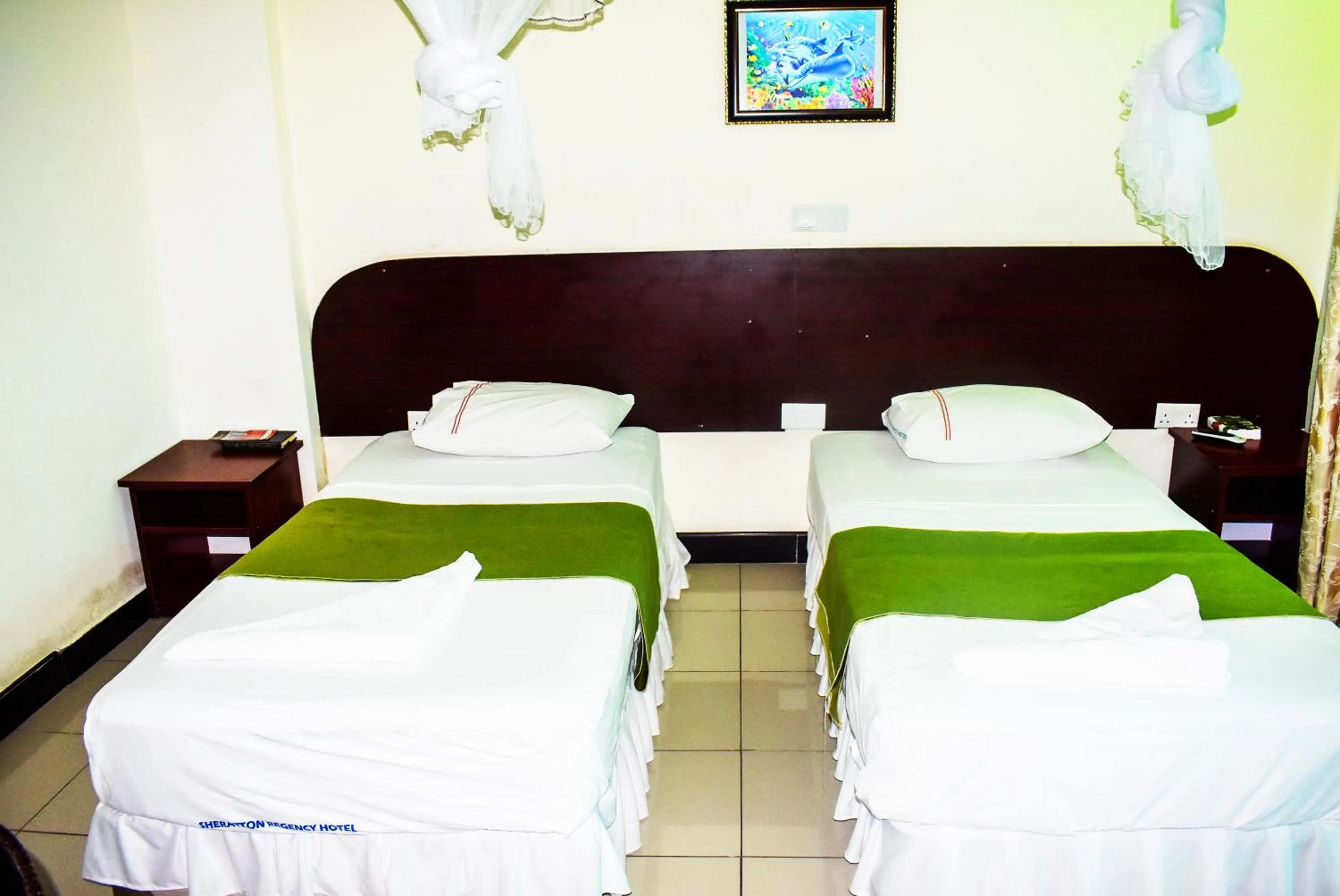 Bedroom, Bed in Sheratton Regency Hotel