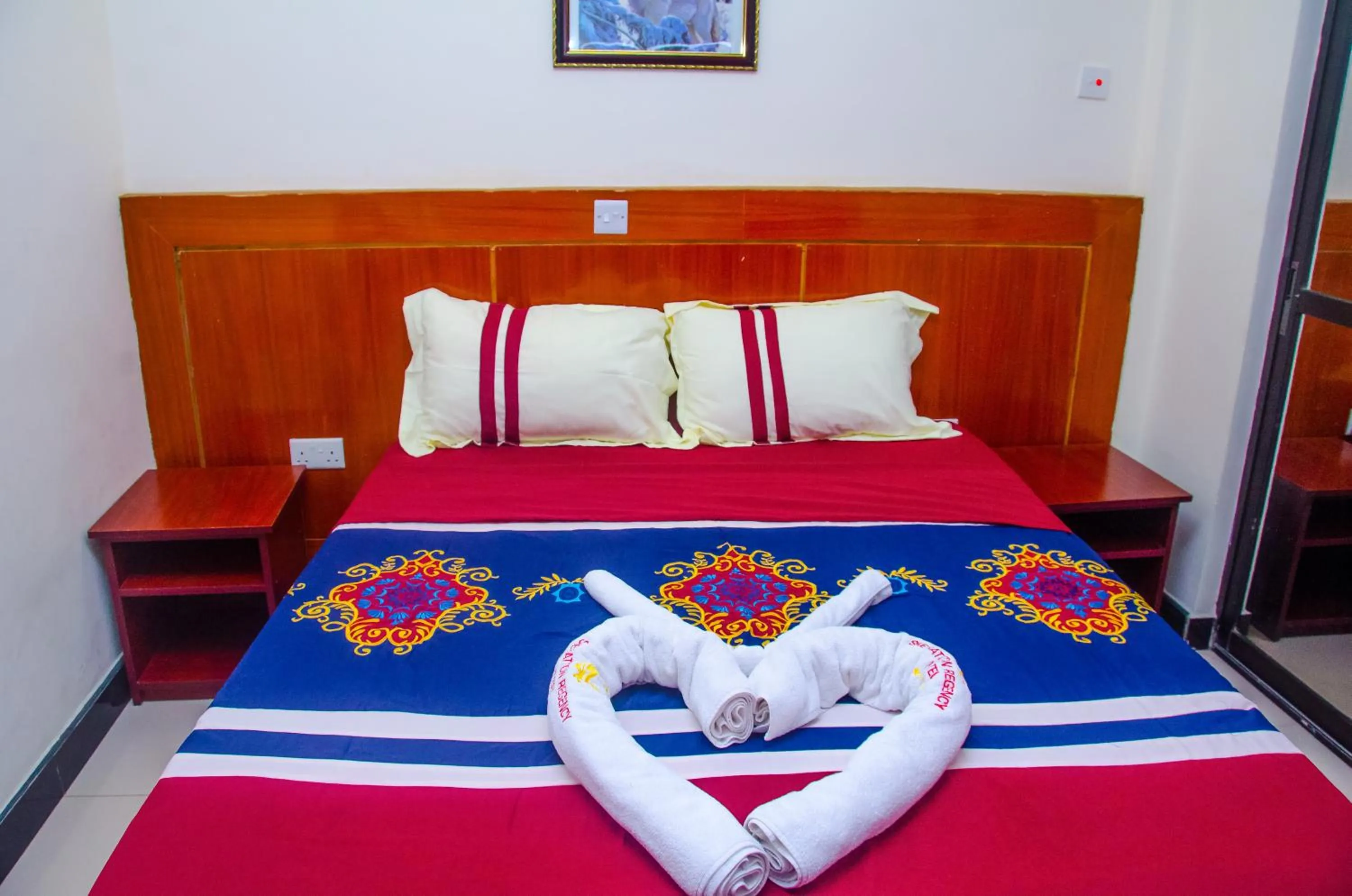 Photo of the whole room, Bed in Sheratton Regency Hotel