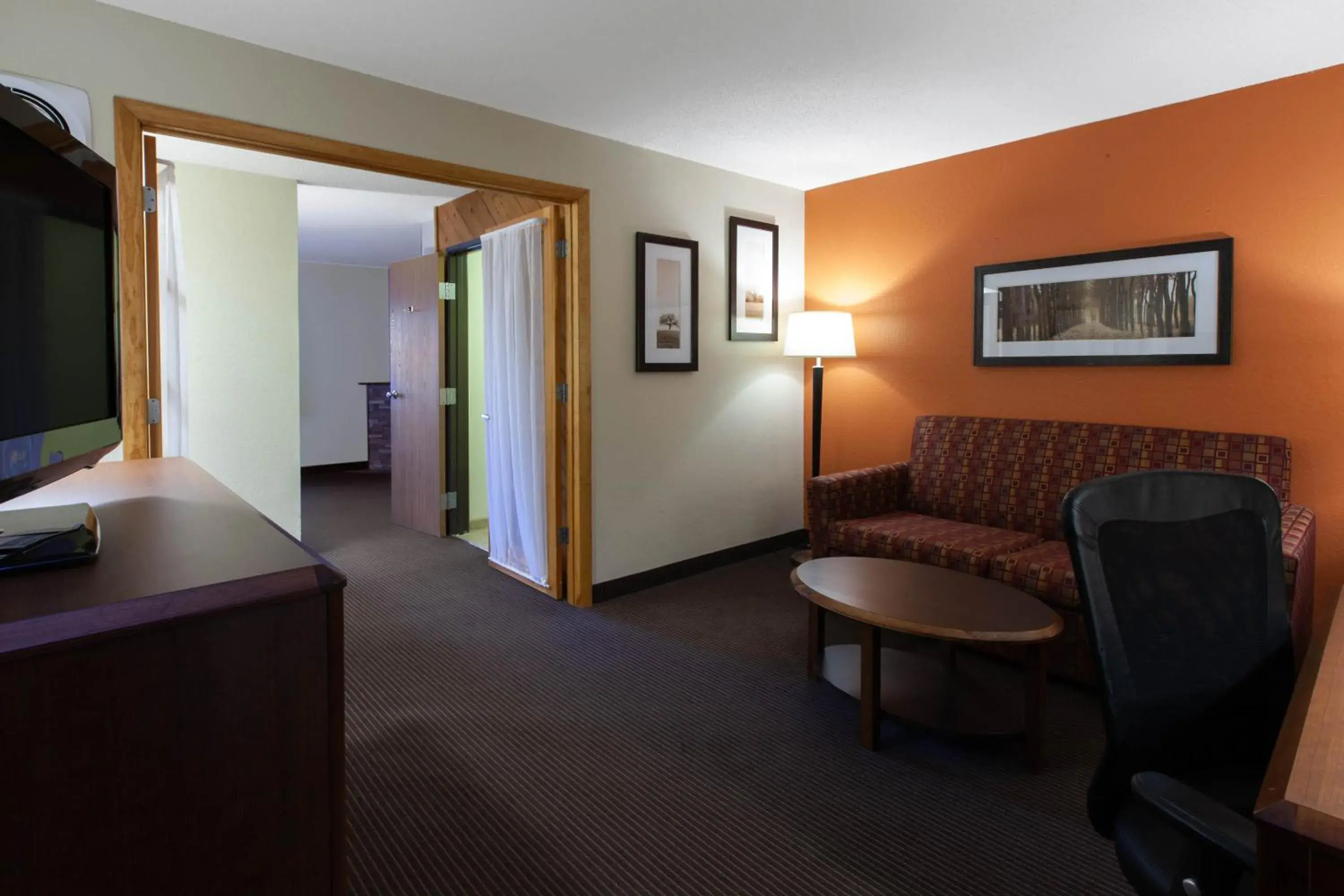 Living room in AmericInn by Wyndham Iron River Living room in AmericInn by Wyndham Iron River