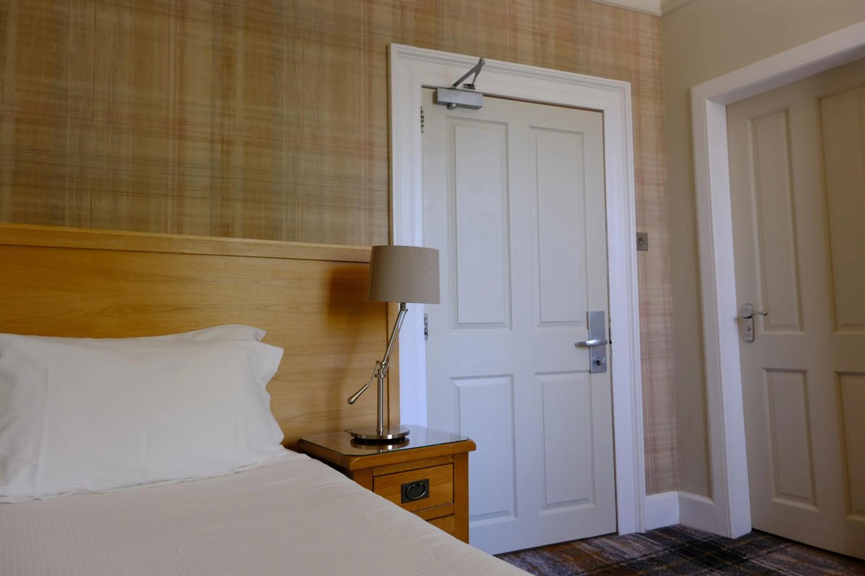 Photo of the whole room, Bed in Glen Mhor Hotel at Uile-bheist 'Brewstillery'