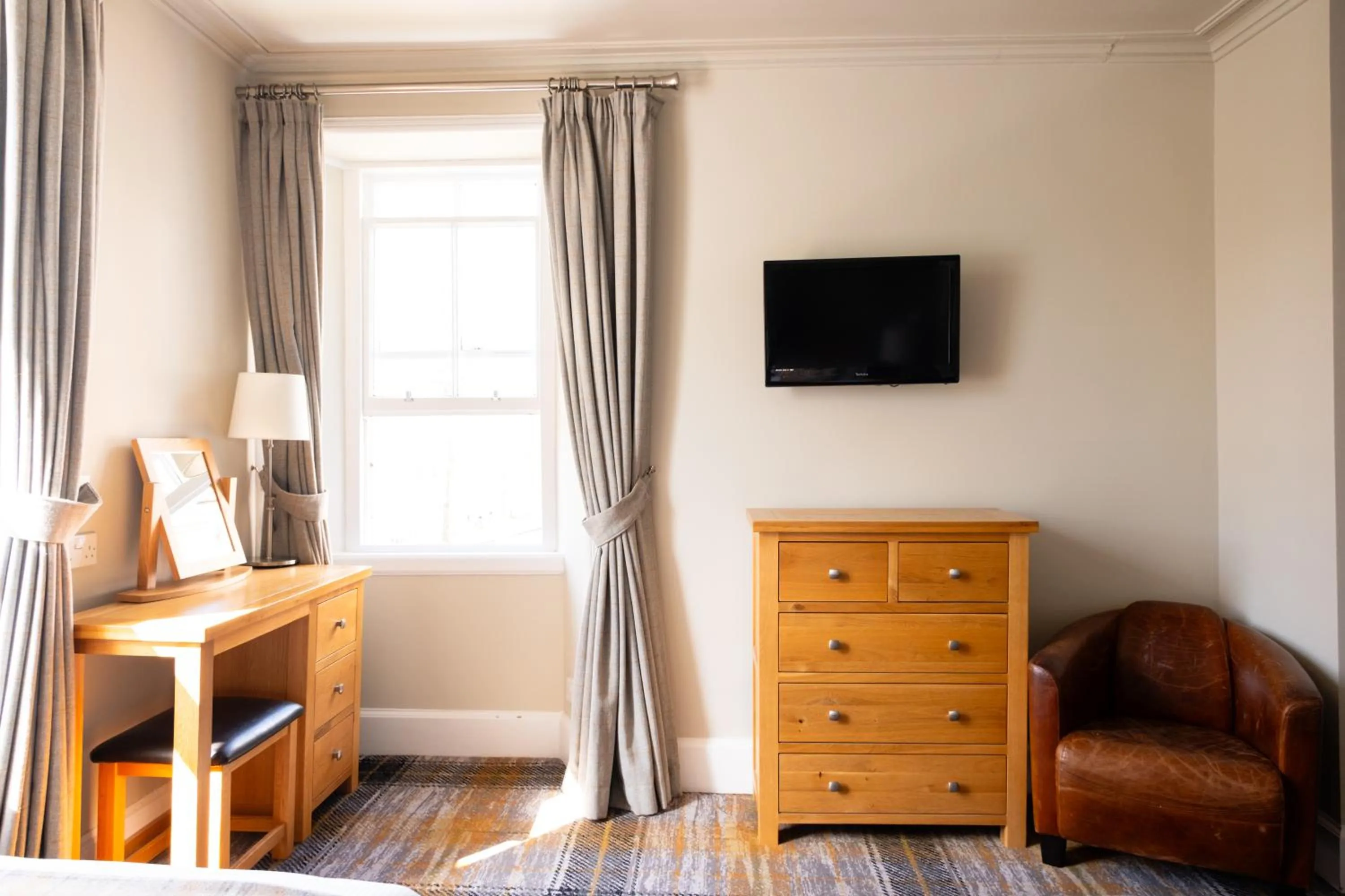 Bedroom in Glen Mhor Hotel at Uile-bheist 'Brewstillery'