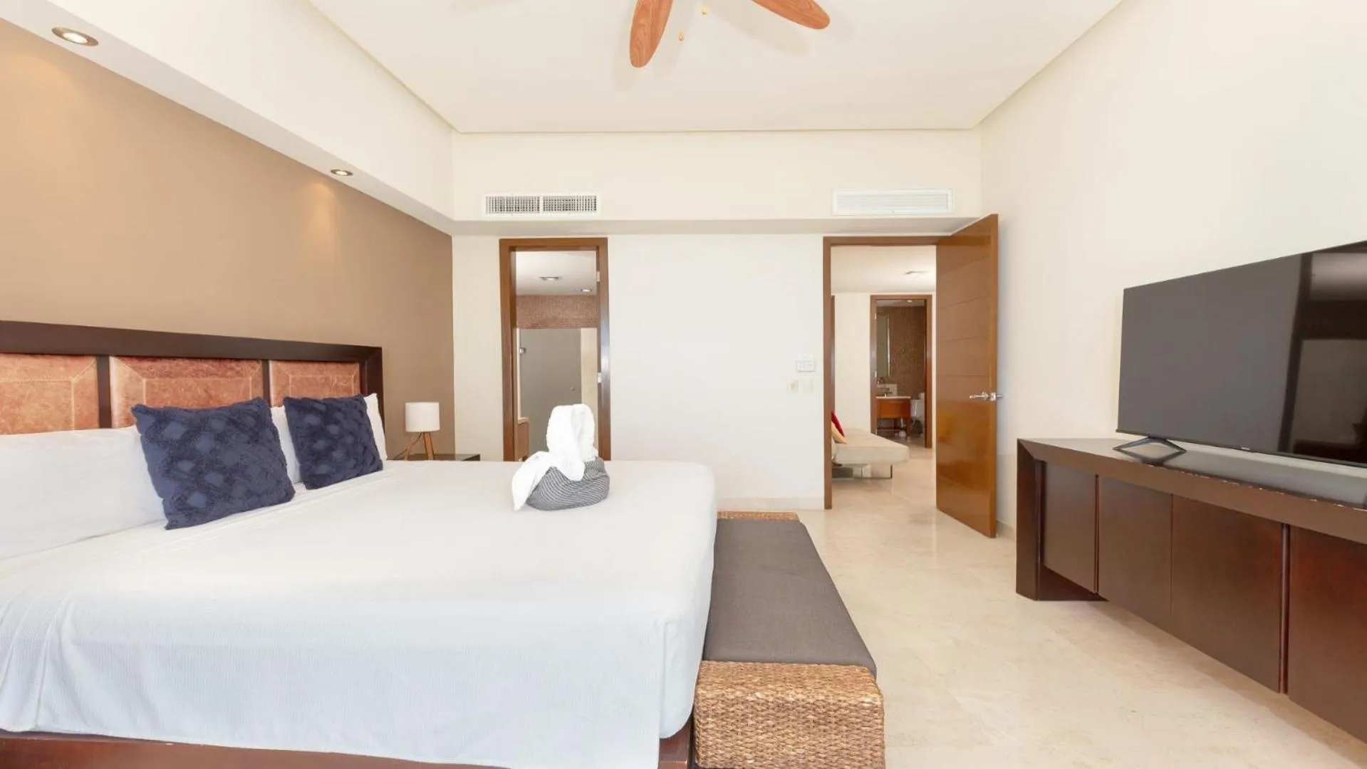 Photo of the whole room, Bed in Encanto Living Two Bedroom Unit by Kivoya