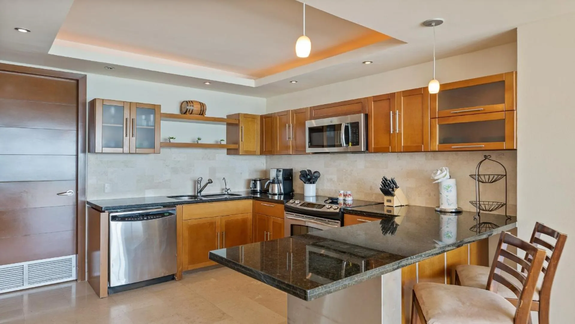 Kitchen or kitchenette in Encanto Living Two Bedroom Unit by Kivoya