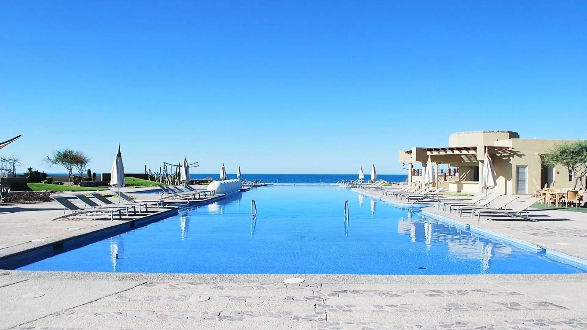 Swimming pool in Encanto Living Two Bedroom Unit by Kivoya