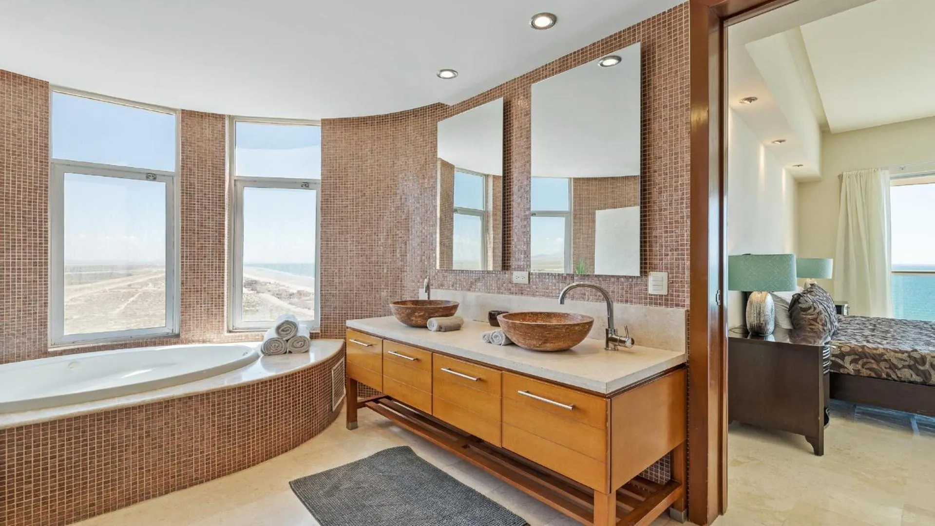 Bathroom, Bed in Encanto Living Two Bedroom Unit by Kivoya