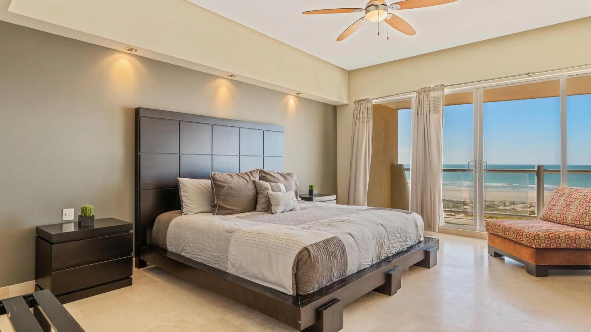 Photo of the whole room, Bed in Encanto Living Two Bedroom Unit by Kivoya