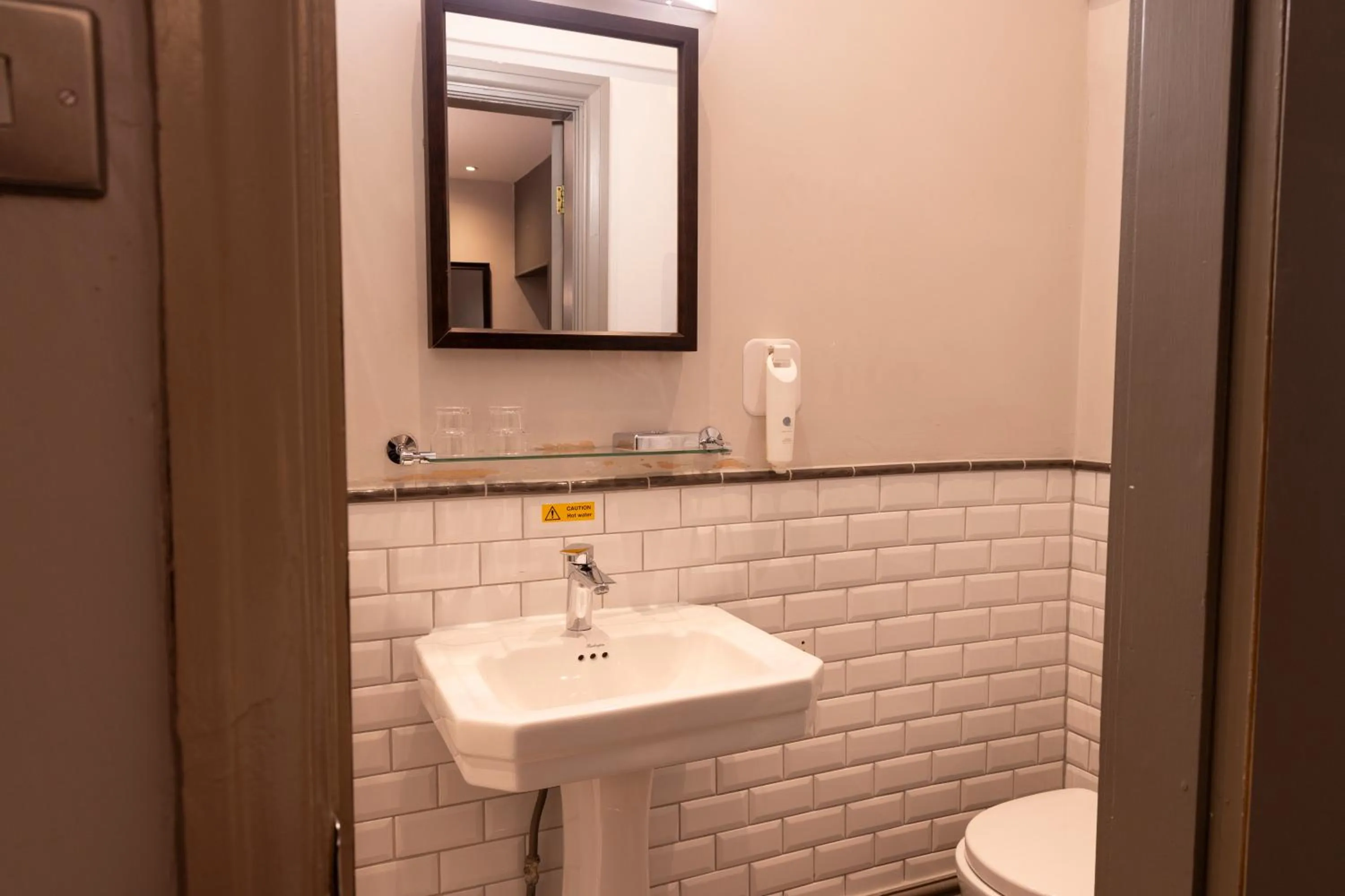Bathroom in Hartwood Hall by Greene King Inns