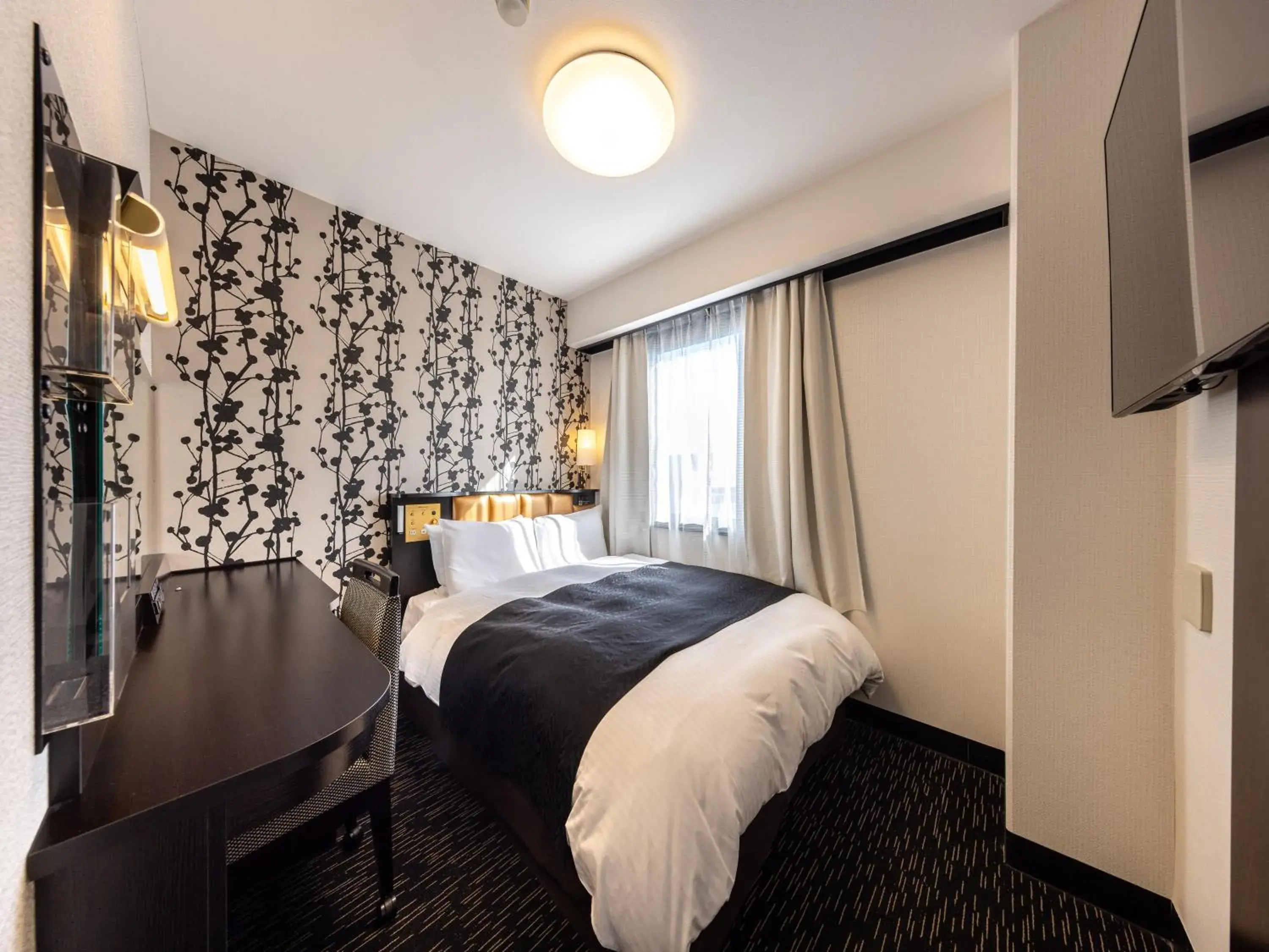 Bed in APA Hotel Uozu Ekimae Bed in APA Hotel Uozu Ekimae