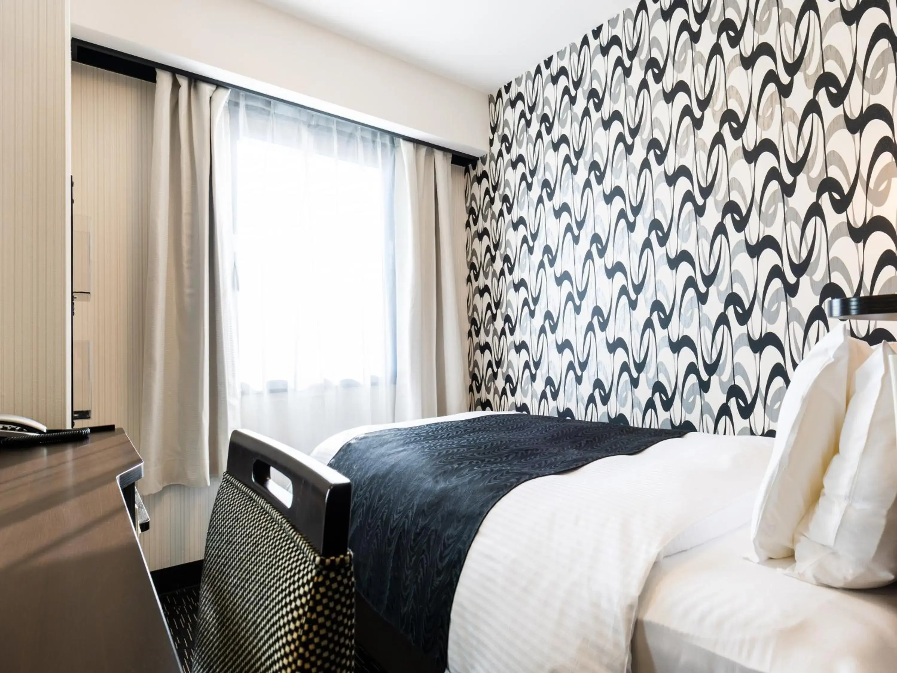 Bed in APA Hotel Uozu Ekimae Bed in APA Hotel Uozu Ekimae