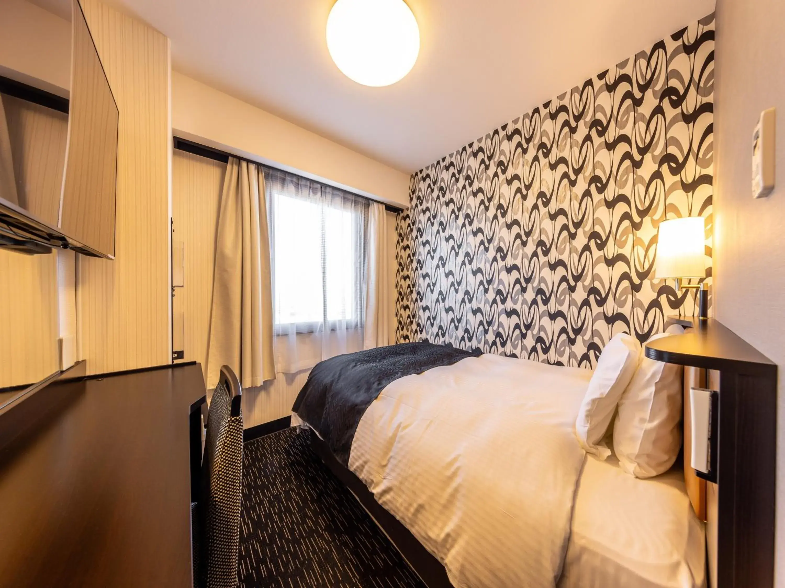 Bed in APA Hotel Uozu Ekimae Bed in APA Hotel Uozu Ekimae