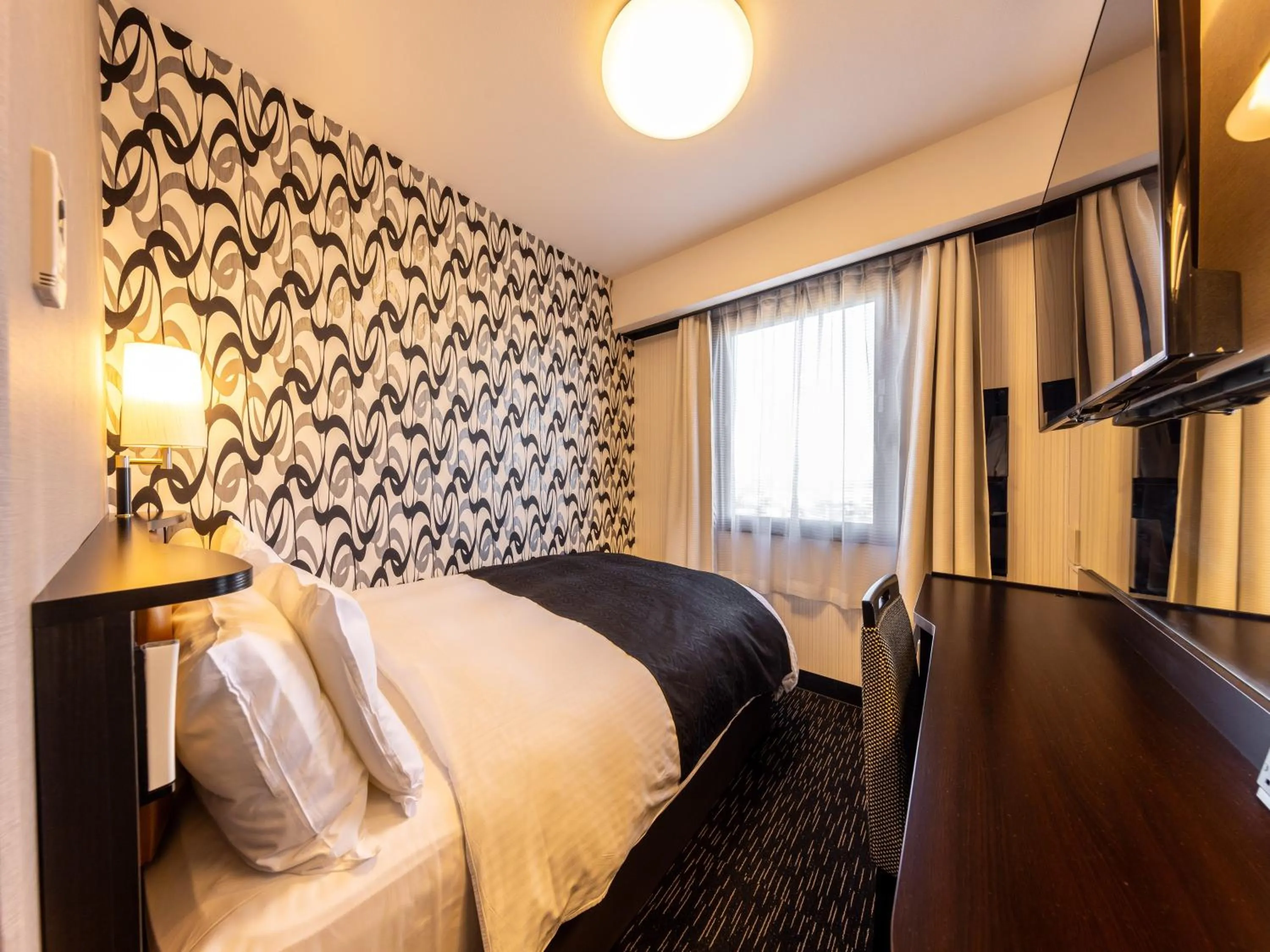 Bed in APA Hotel Uozu Ekimae