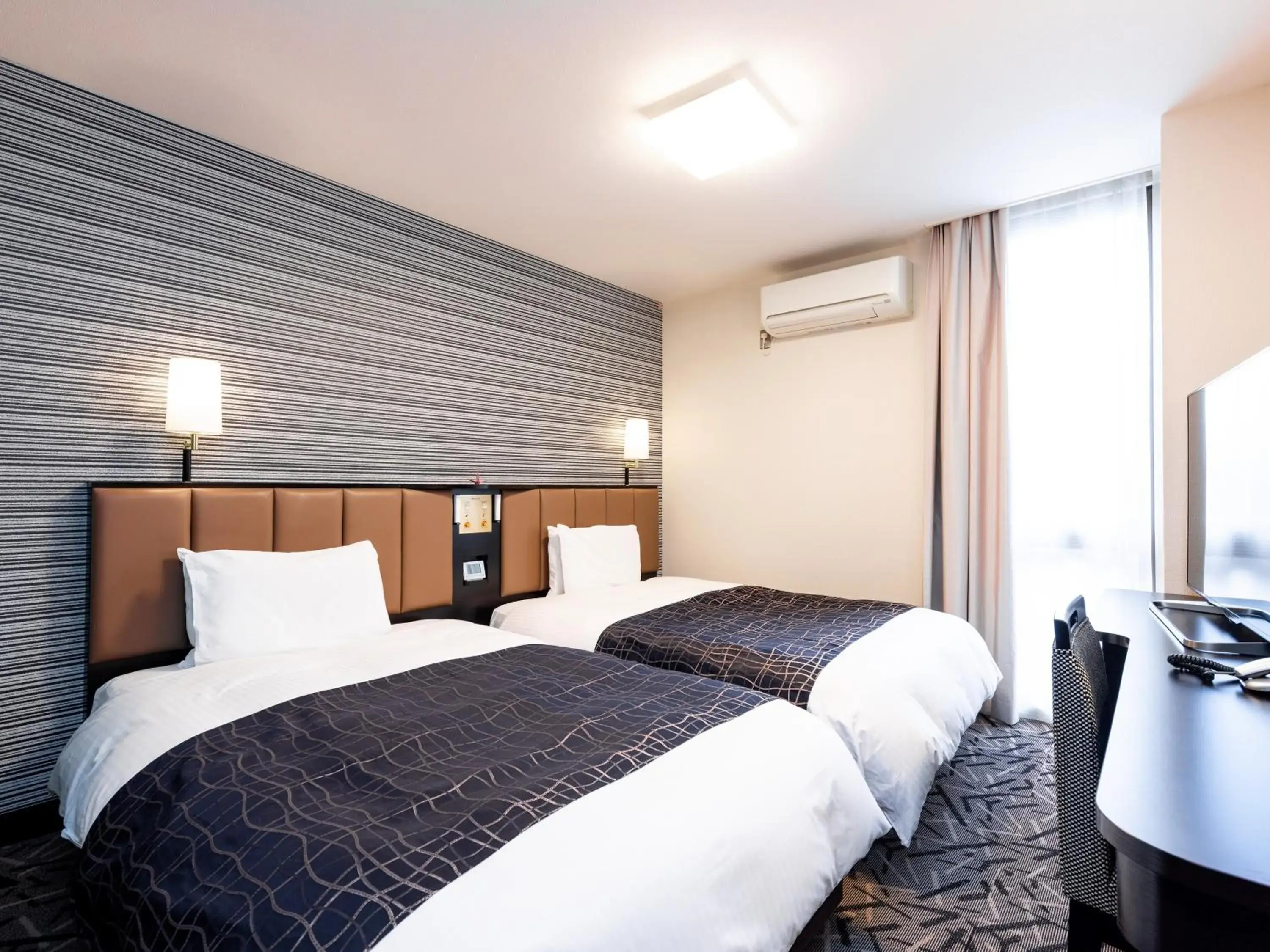 Photo of the whole room, Bed in APA Hotel Saga Ekimae Chuo Photo of the whole room, Bed in APA Hotel Saga Ekimae Chuo