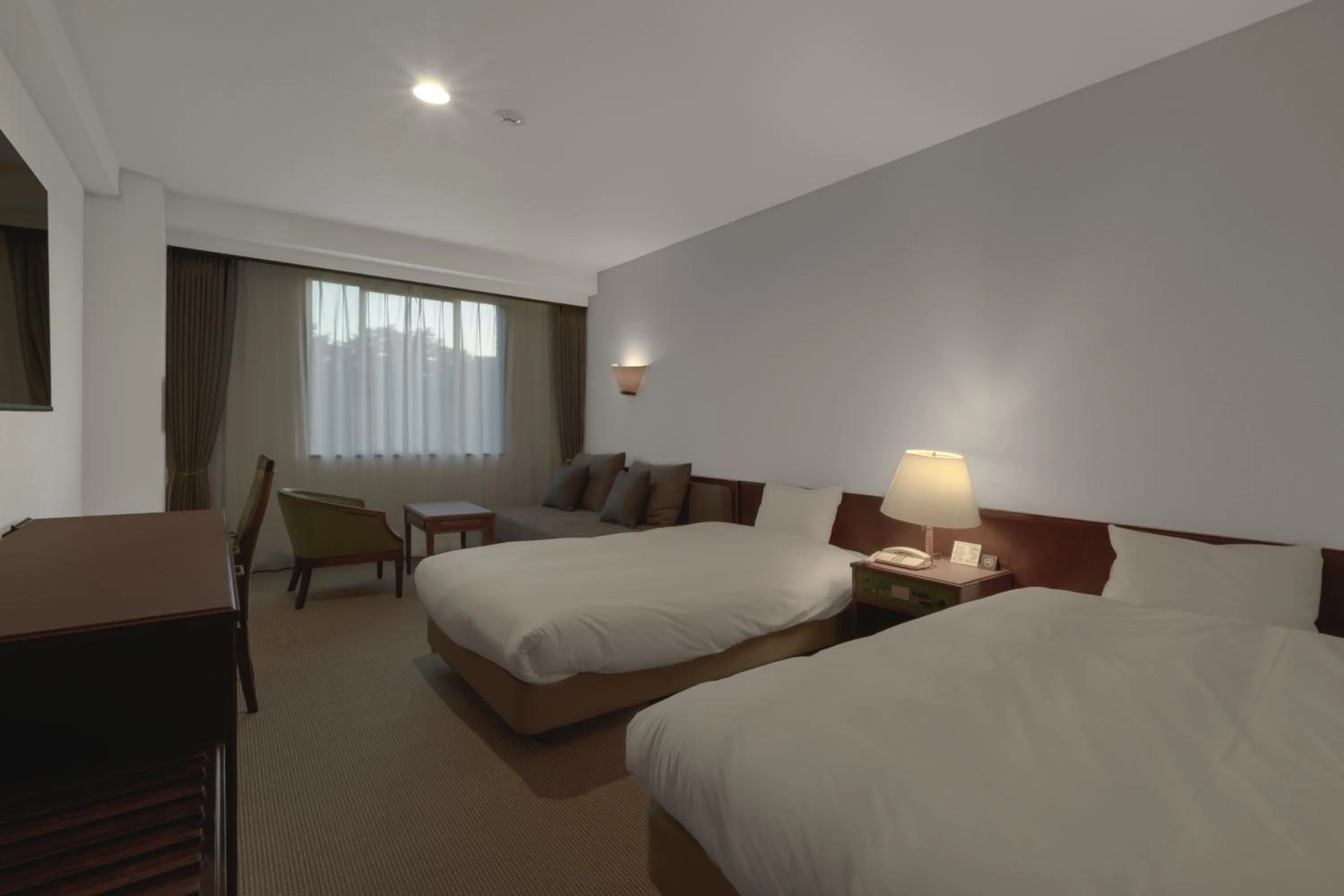 Photo of the whole room, Bed in Oarai Park Hotel