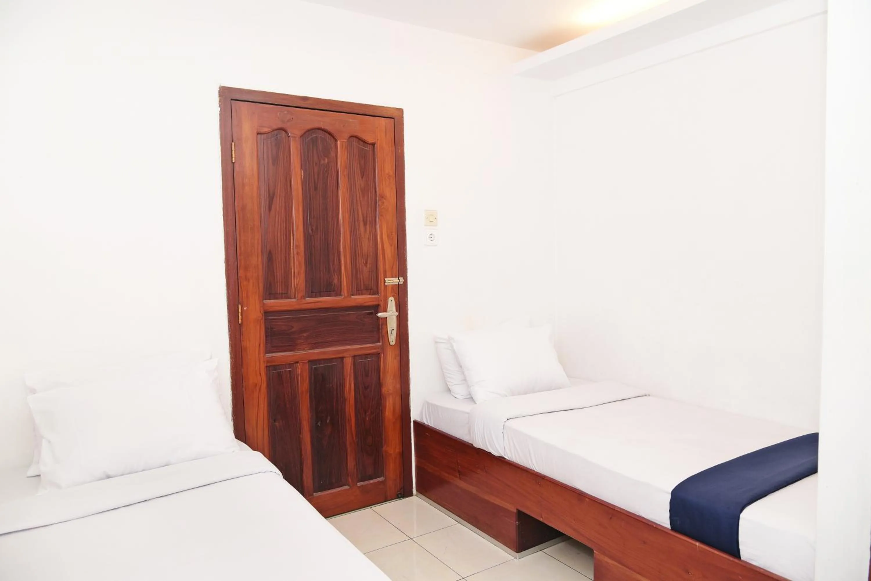 Bed in Hotel Olympic Semarang