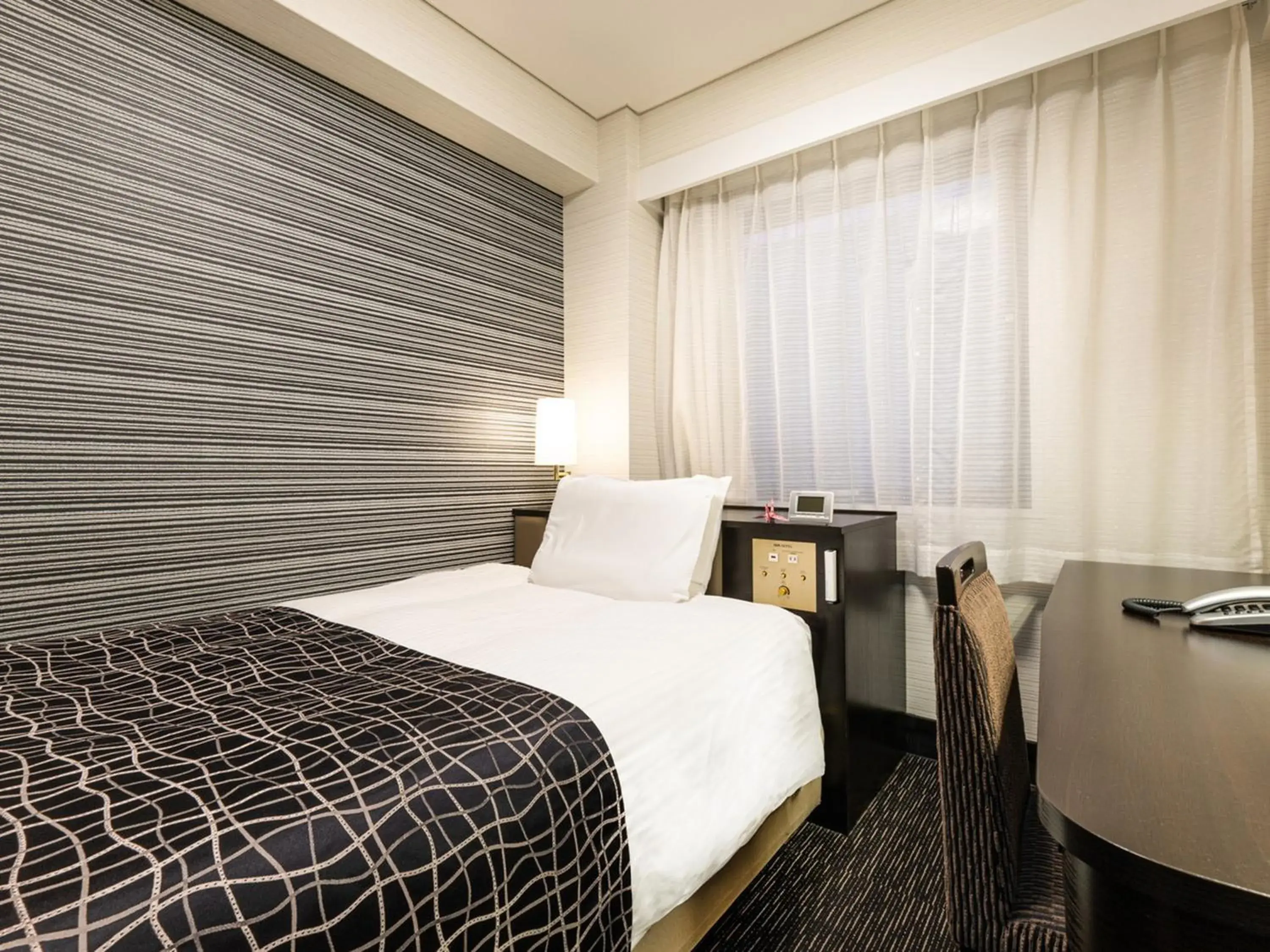 Photo of the whole room, Bed in APA Hotel Nagasaki Ekiminami Photo of the whole room, Bed in APA Hotel Nagasaki Ekiminami