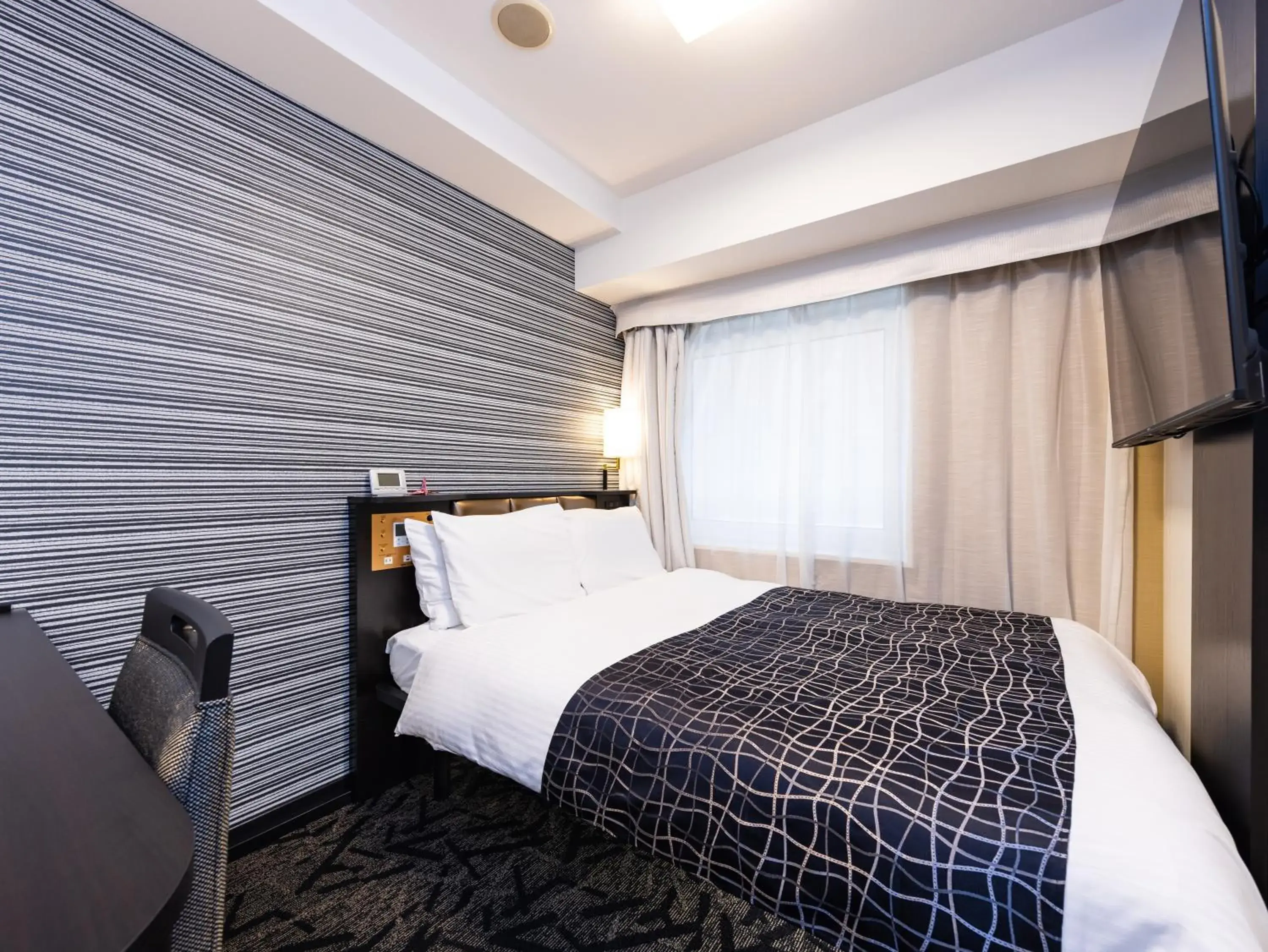 Photo of the whole room, Bed in APA Hotel Sendai Eki Itsutsubashi Photo of the whole room, Bed in APA Hotel Sendai Eki Itsutsubashi