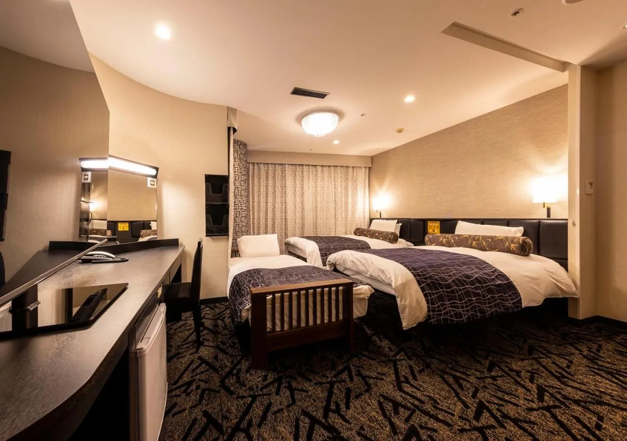 Photo of the whole room, Bed in APA Hotel Kanazawa Ekimae