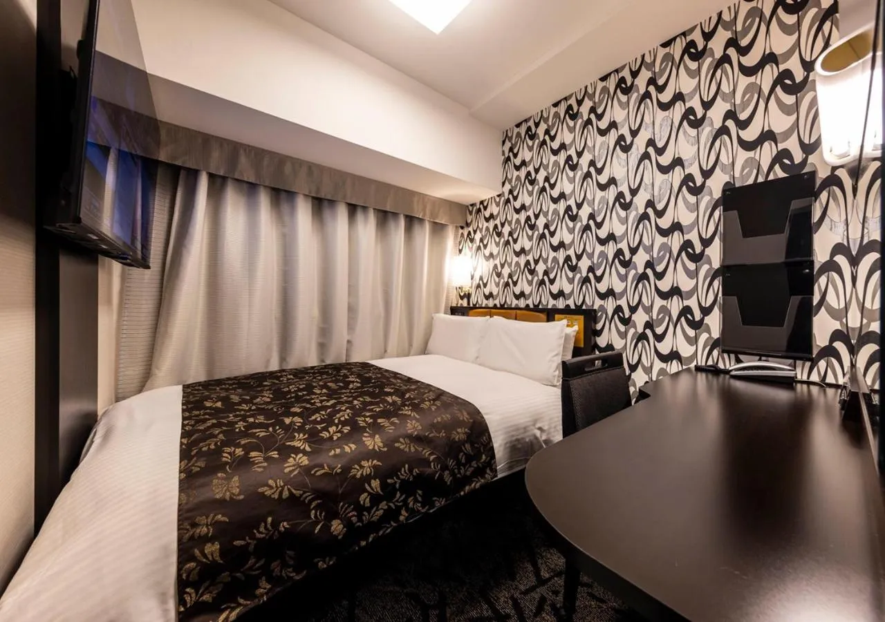 Photo of the whole room, Bed in APA Hotel Kanazawa Ekimae
