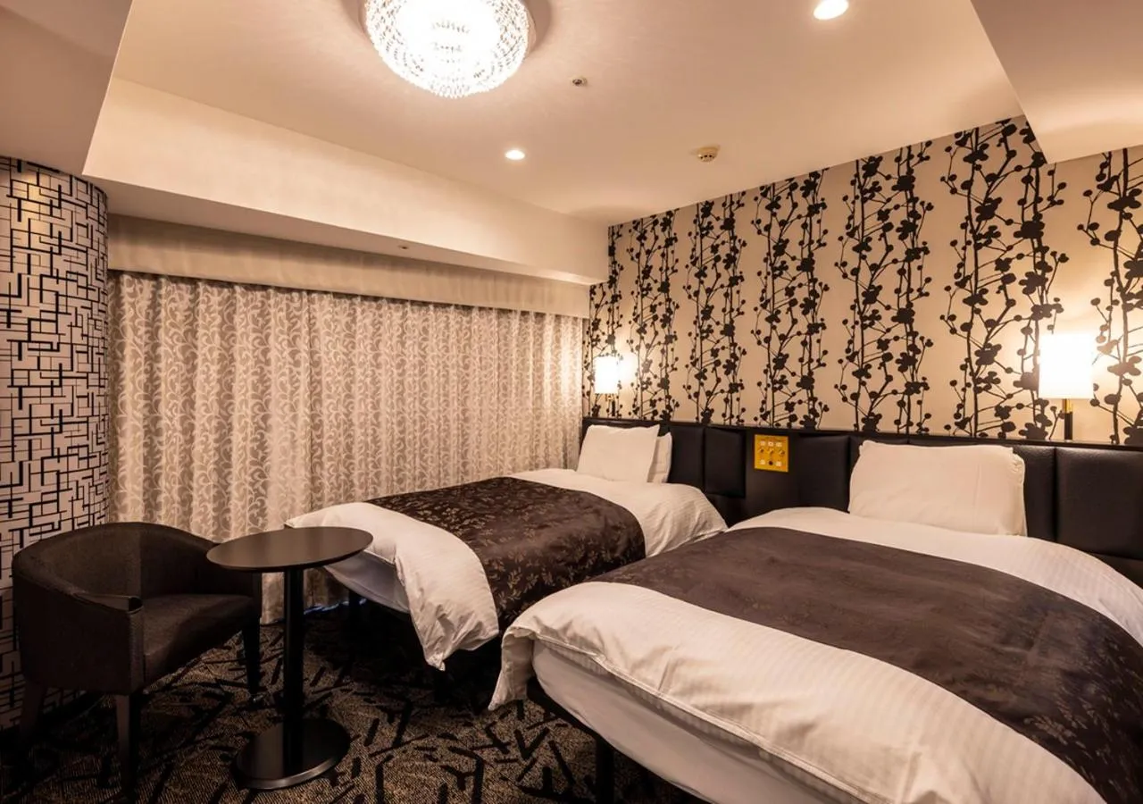 Photo of the whole room, Bed in APA Hotel Kanazawa Ekimae