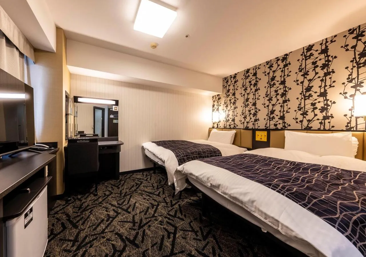 Photo of the whole room, Bed in APA Hotel Kanazawa Ekimae