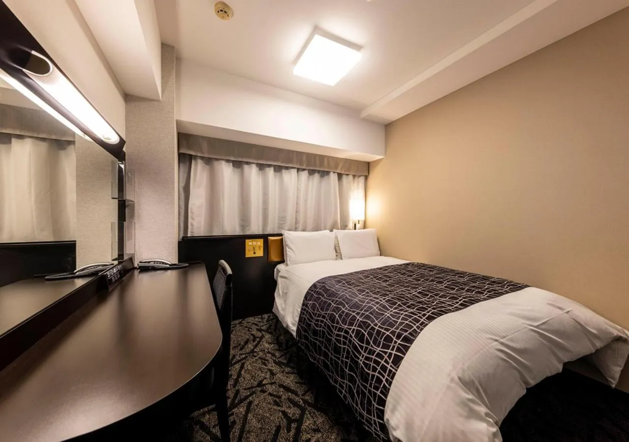 Photo of the whole room, Bed in APA Hotel Kanazawa Ekimae