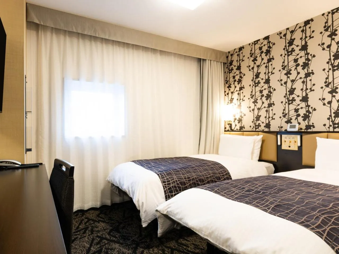 Bed in APA Hotel Kanazawa Ekimae