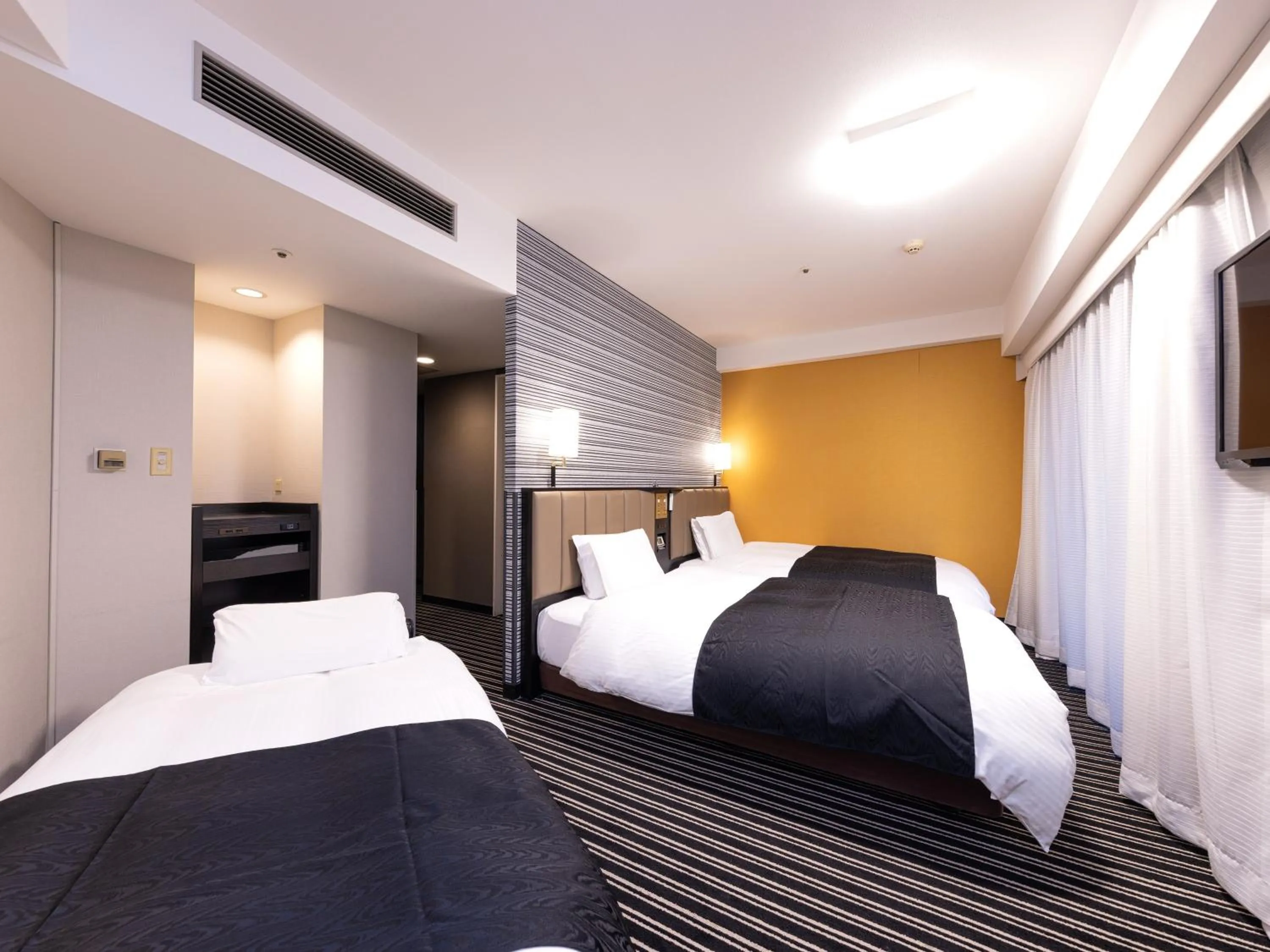 Bed in APA Hotel Fukuoka Watanabedori Ekimae EXCELLENT