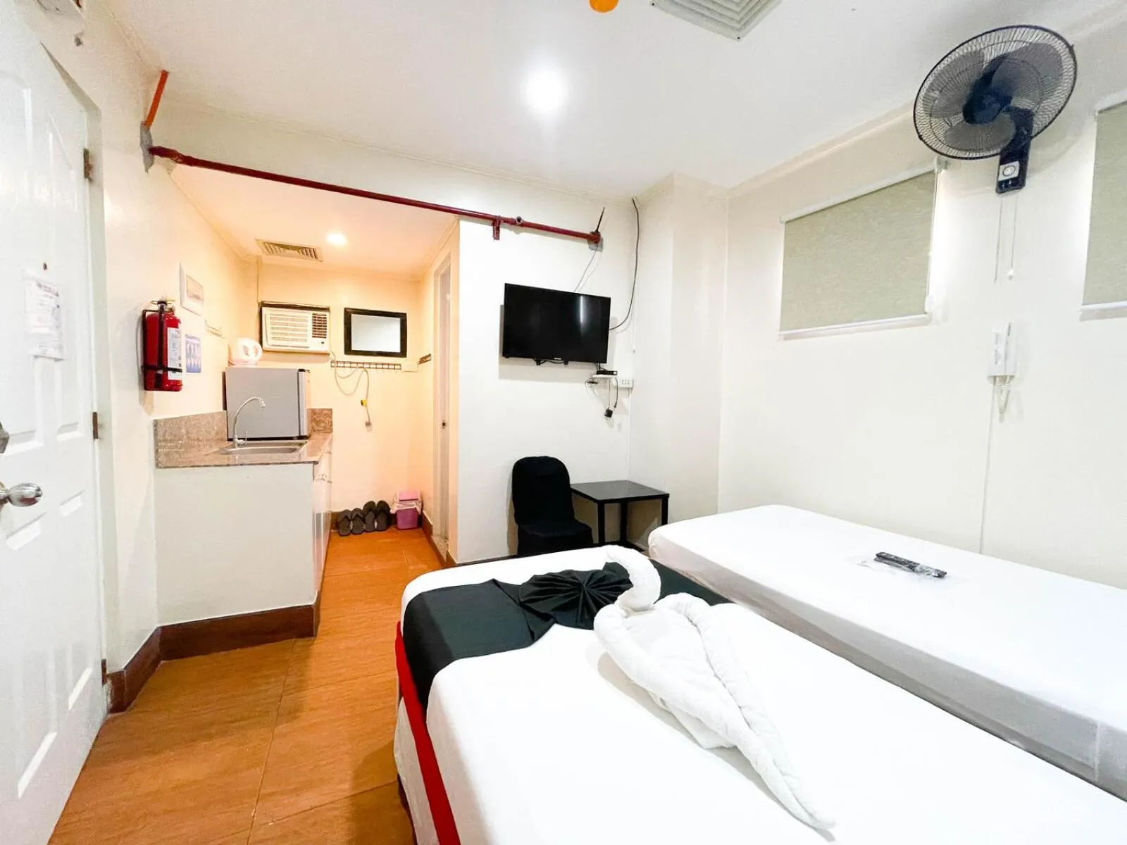 Bed in Chanel Paris Hotel powered by Cocotel