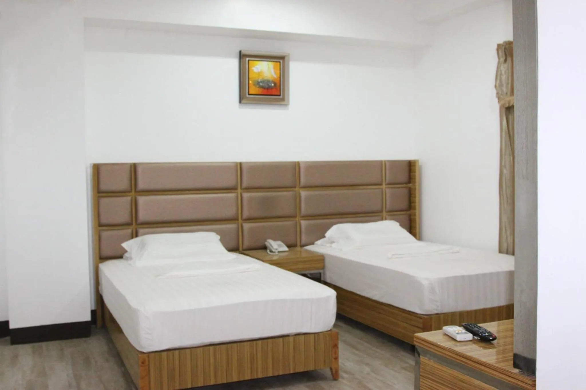 Bed in Jeamco Royal Hotel-Palawan