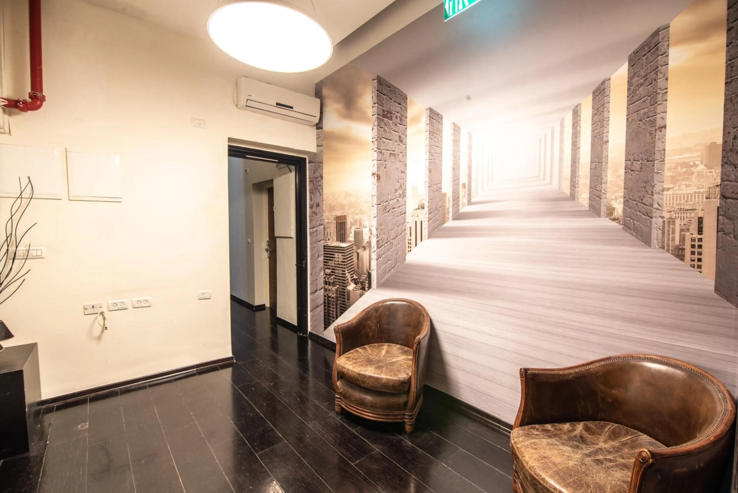 Communal lounge/ TV room in 27Montefiore - Urban ApartHotel TLV