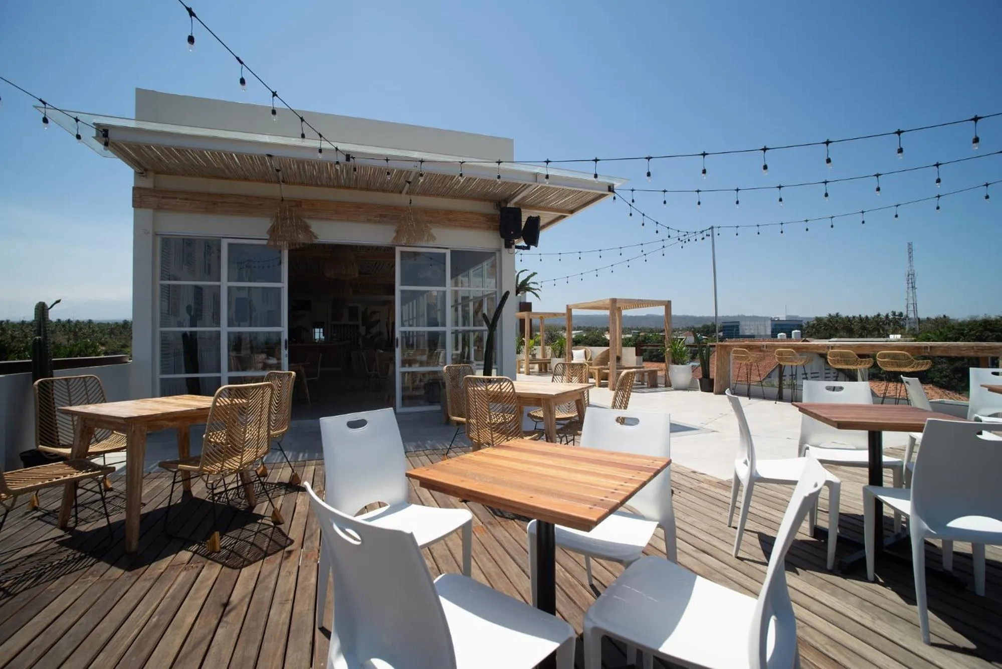 Lounge or bar in Luminor Hotel Banyuwangi By WH