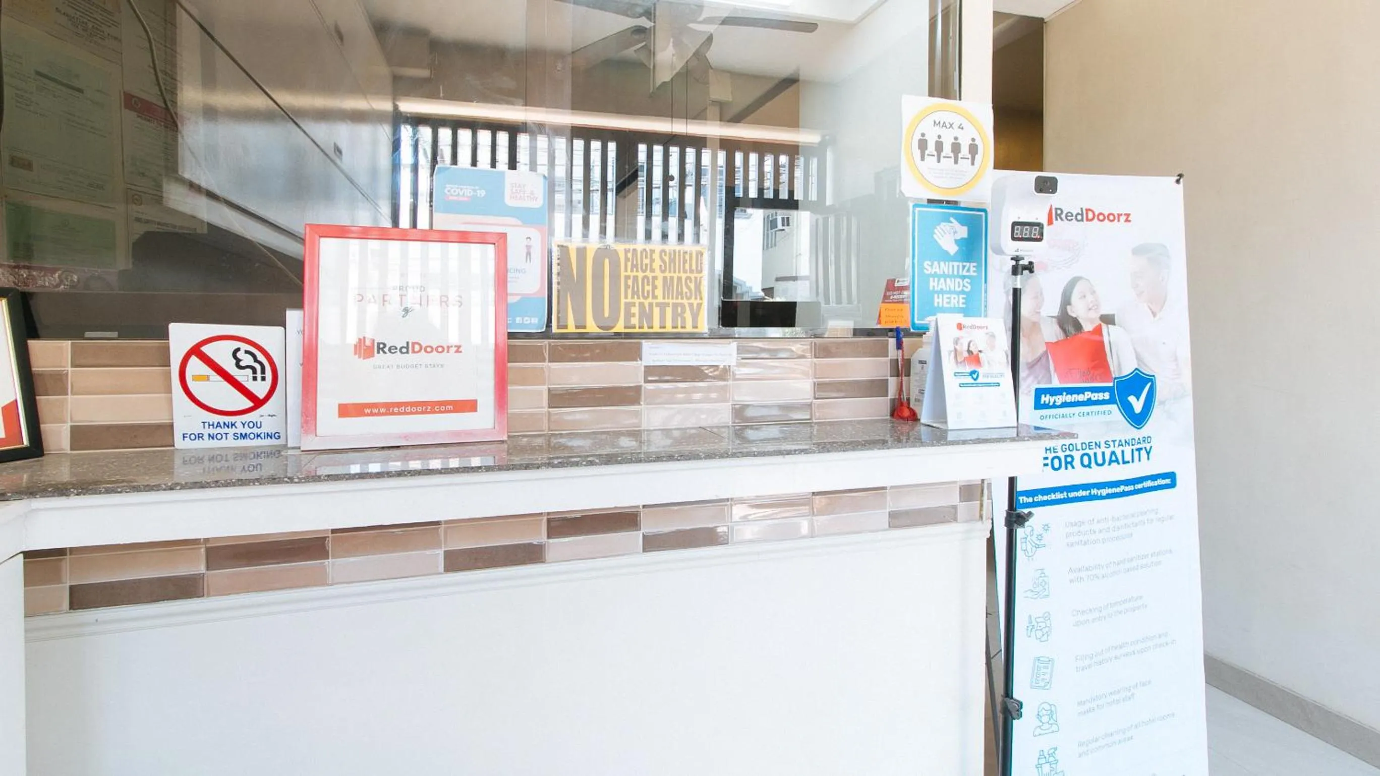 Logo/Certificate/Sign in RedDoorz near NAIA Terminal 1