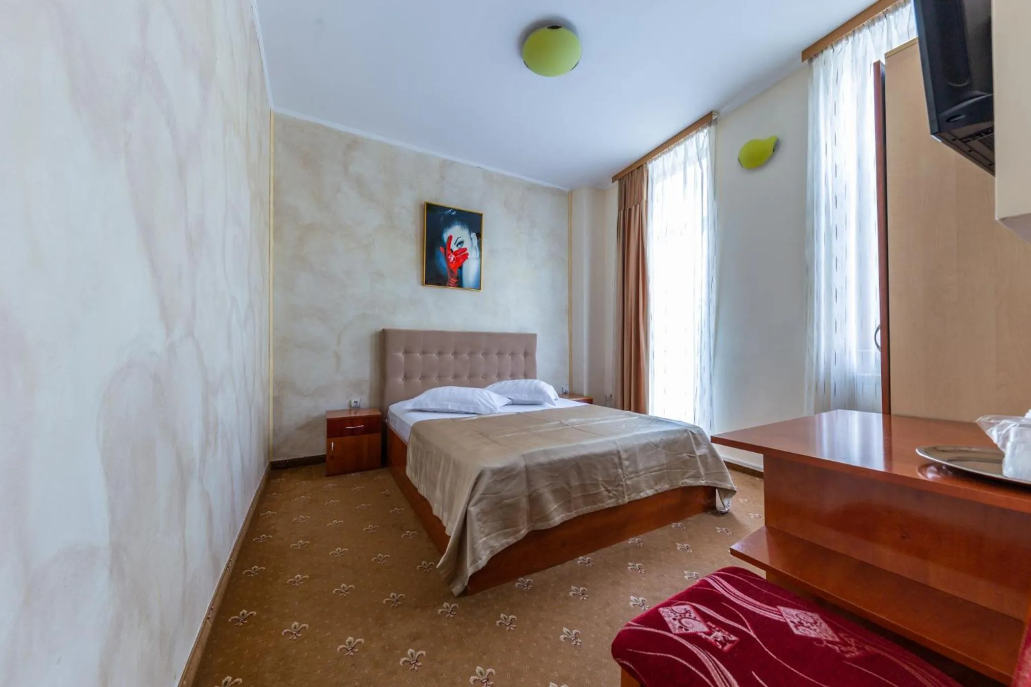 Bed in Hotel Amphitryon