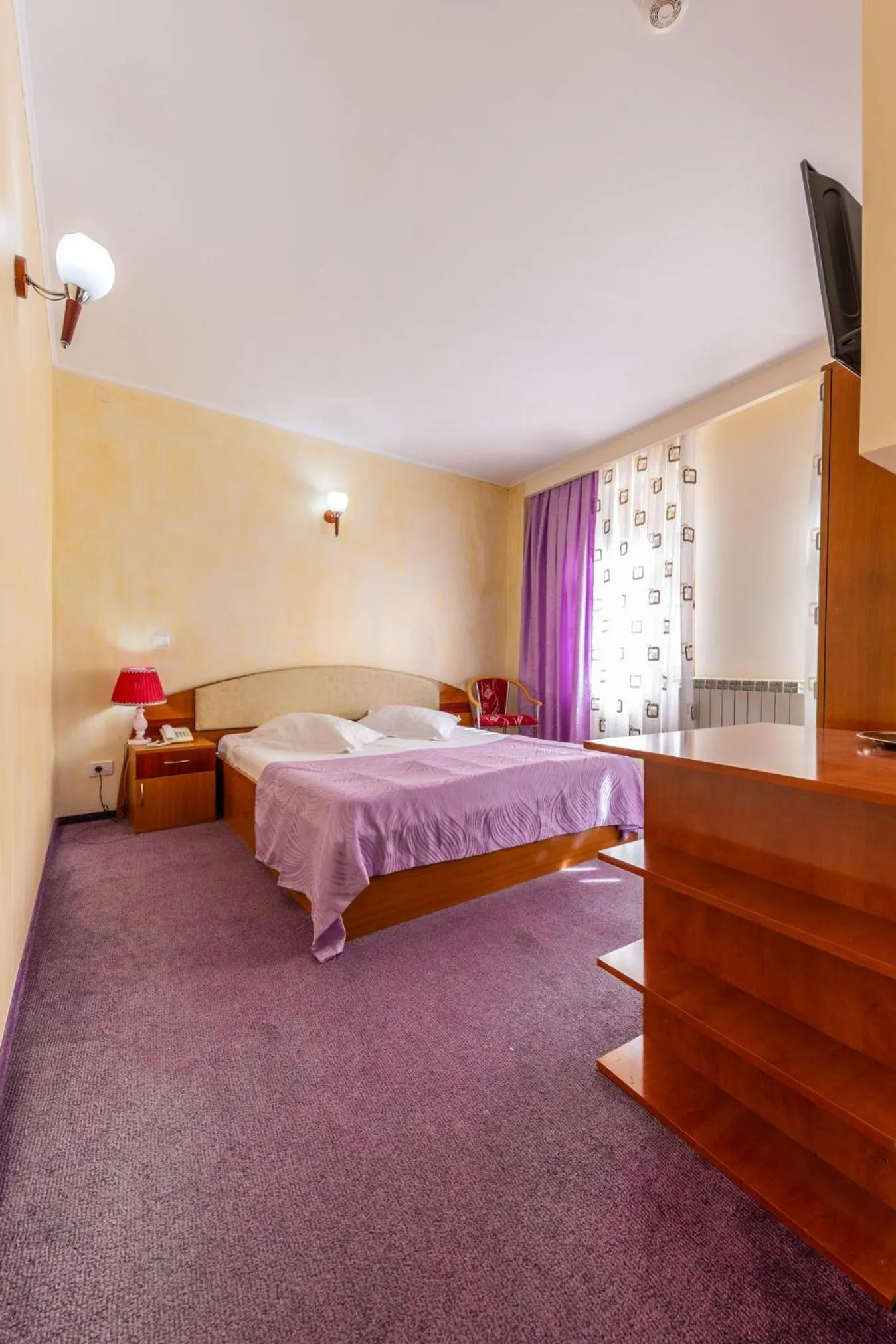 Bed in Hotel Amphitryon