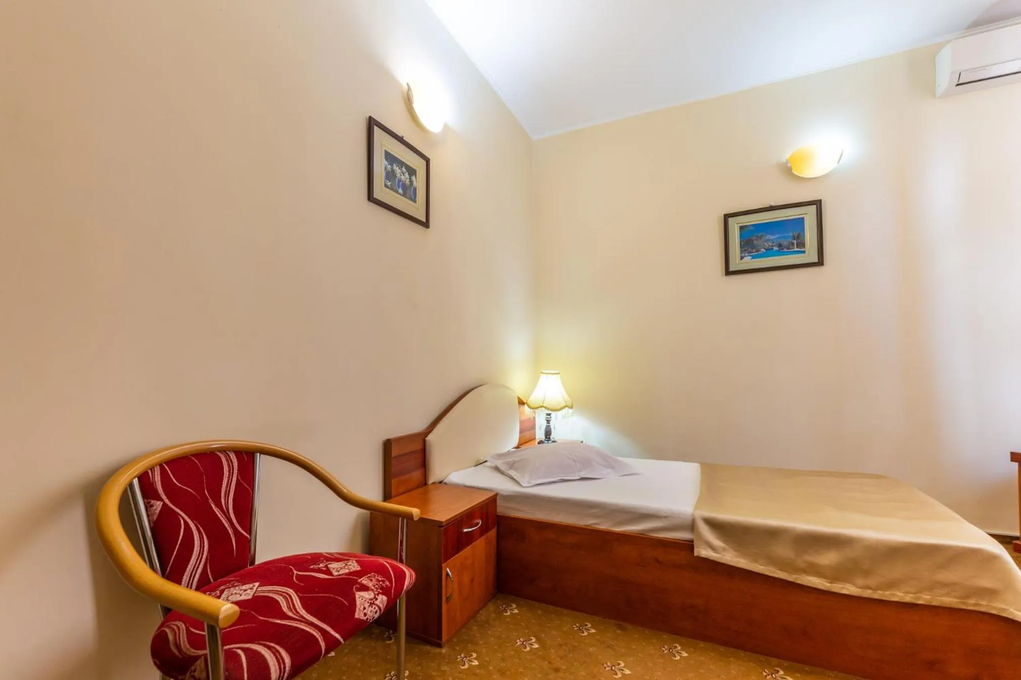 Bed in Hotel Amphitryon