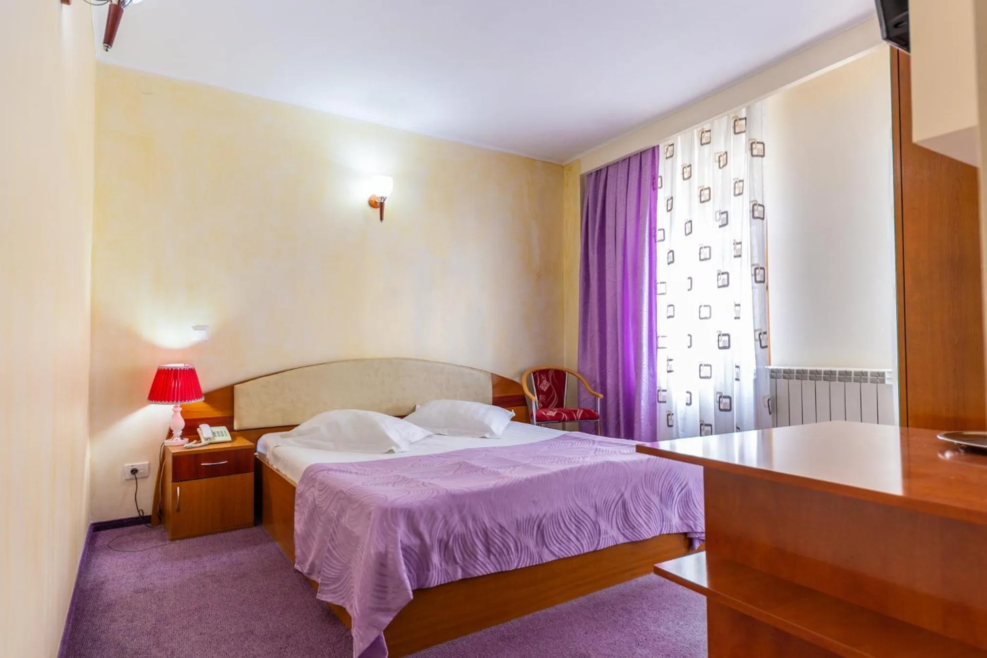 Bed in Hotel Amphitryon