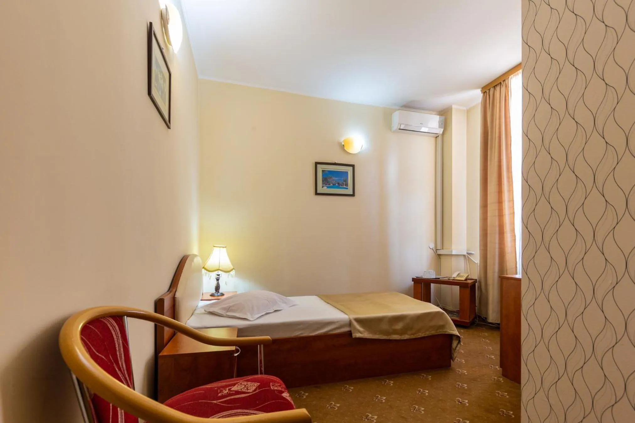 Bed in Hotel Amphitryon