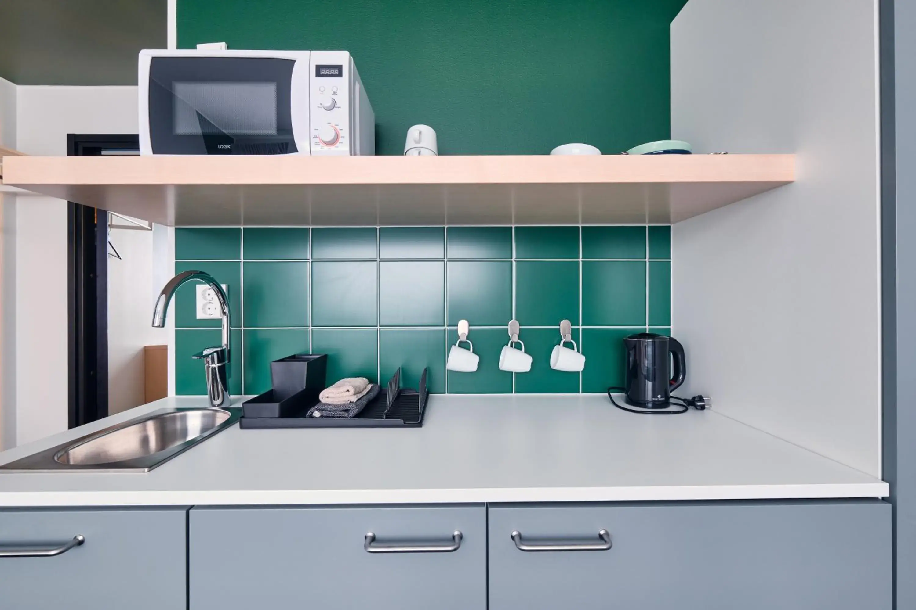 Large Triple Room with Kitchenette in GreenStar Hotel Jyväskylä Large Triple Room with Kitchenette in GreenStar Hotel Jyväskylä