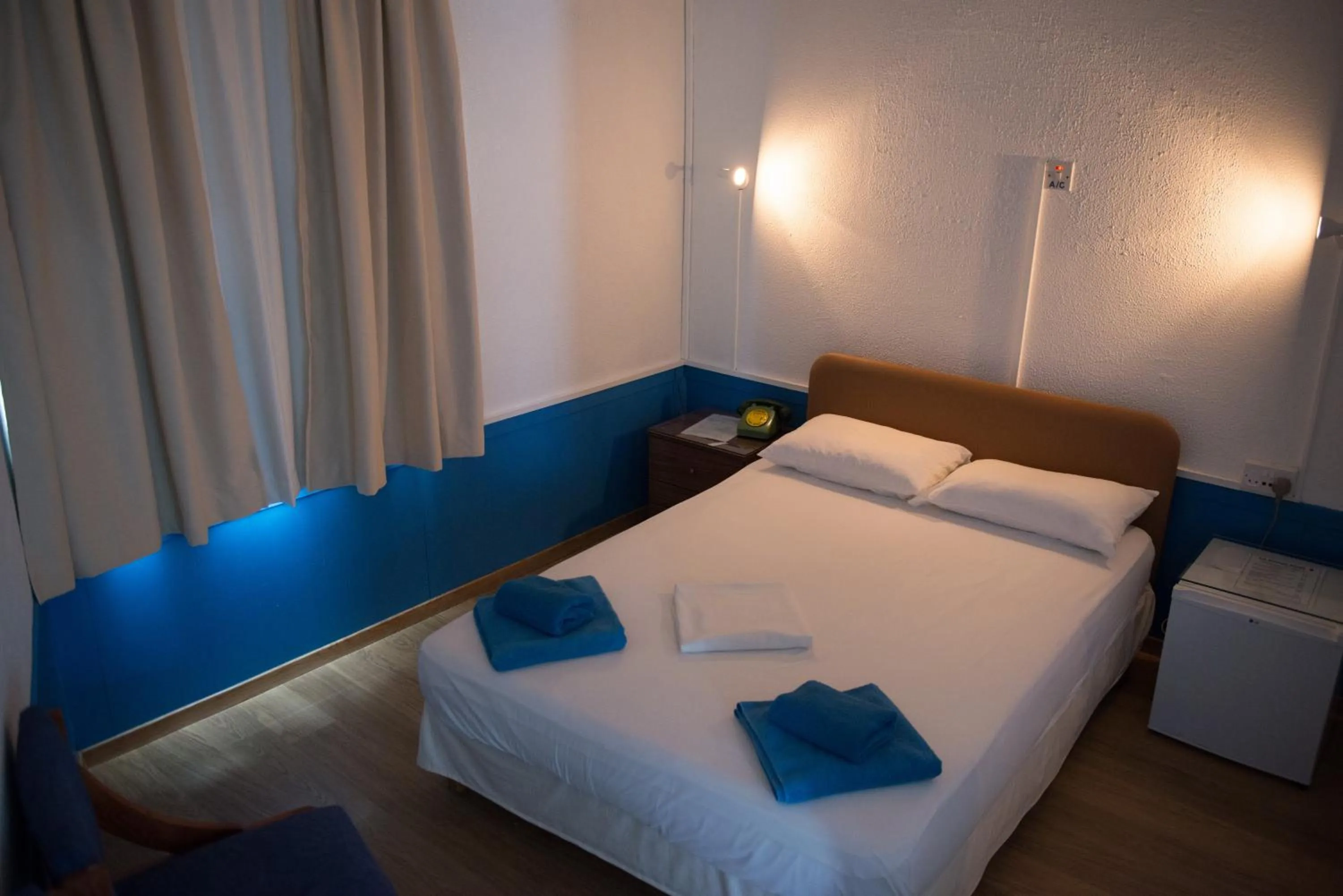 Bedroom, Bed in Le Village Hotel