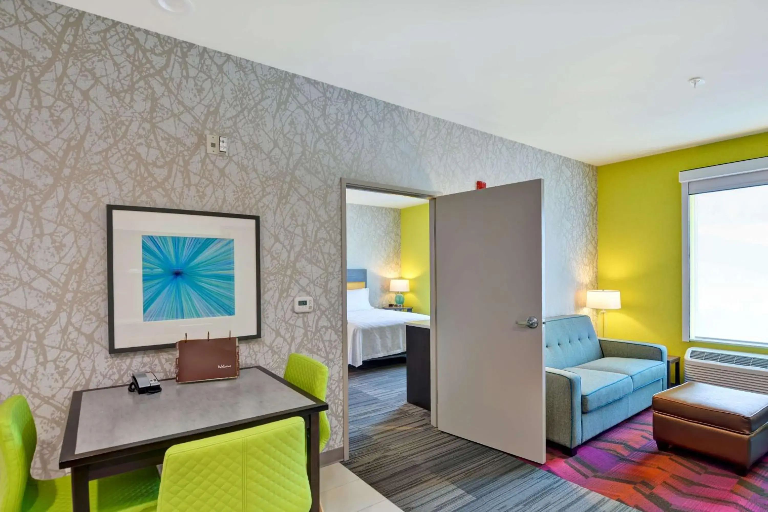 Living room, Bed in Home2 Suites By Hilton Hot Springs Living room, Bed in Home2 Suites By Hilton Hot Springs