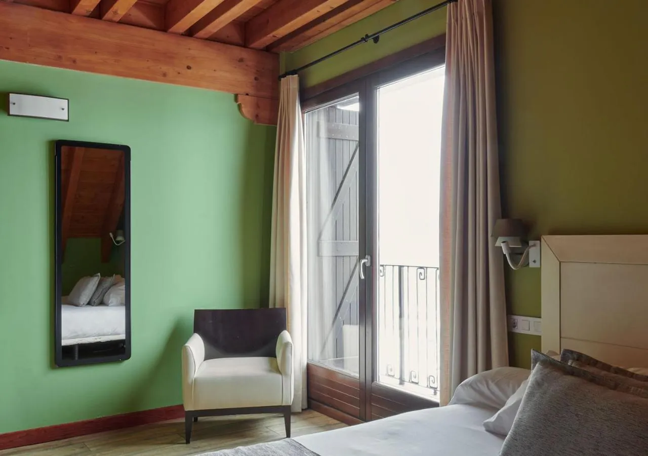 Bedroom, Bed in Apartahotel Tres Quiñones