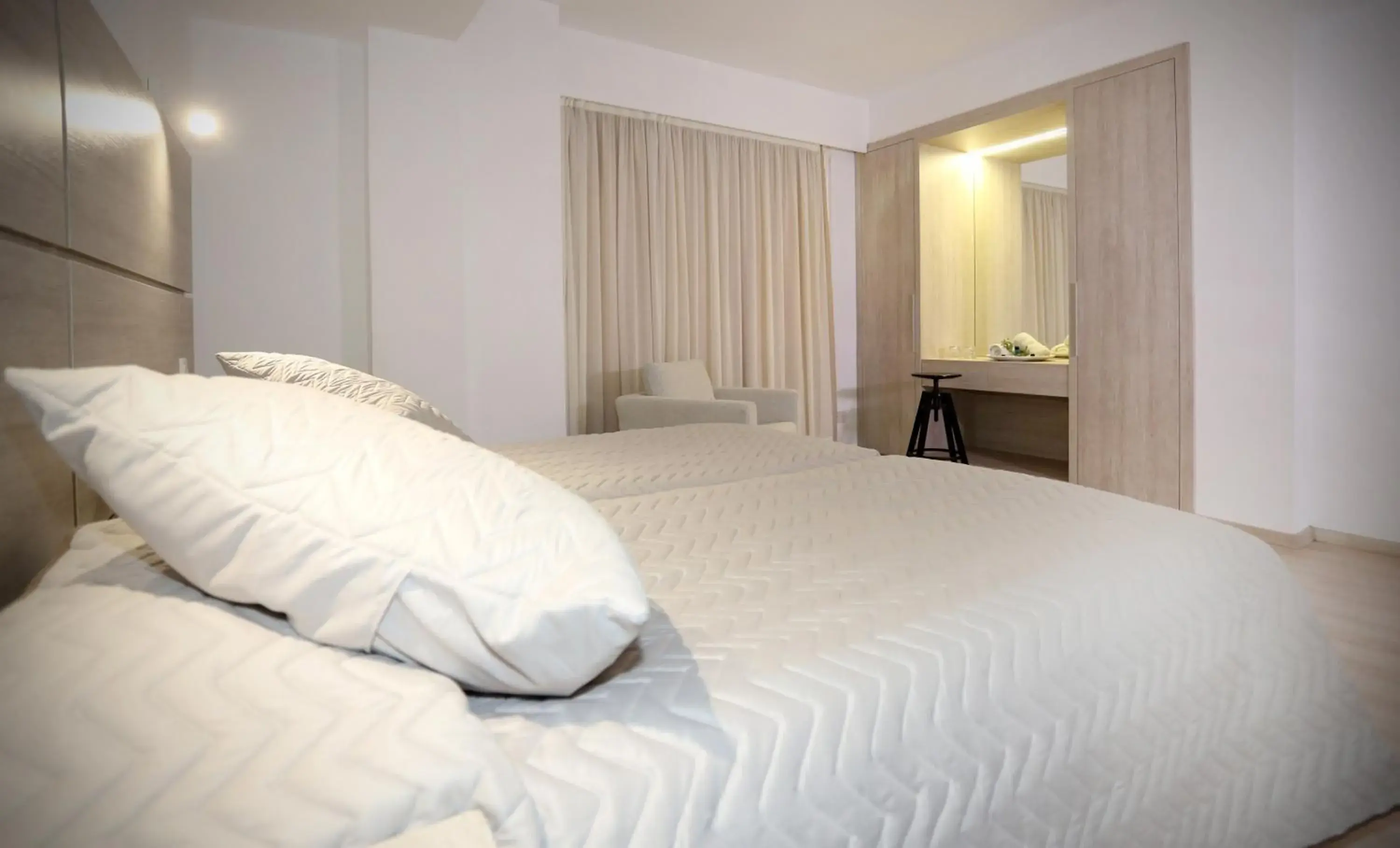 Bed in Pier Beach Hotel Apartments Bed in Pier Beach Hotel Apartments