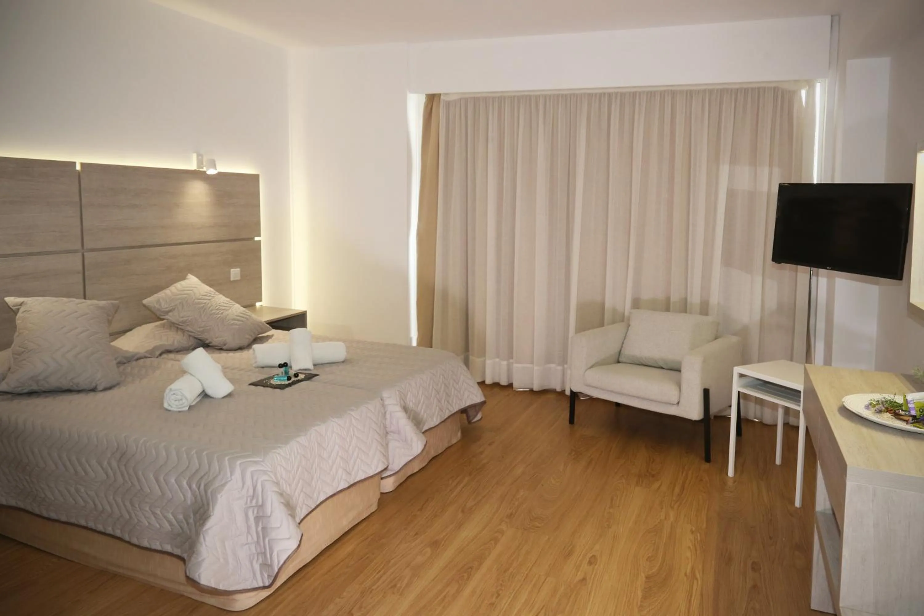 Bed in Pier Beach Hotel Apartments